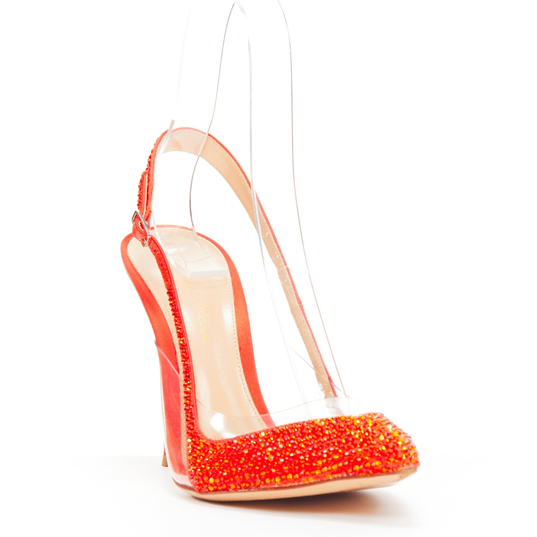 GIANVITO ROSSI red strass crystal encrusted clear PVC slingback pump EU37.5
Reference: NKLL/A00102
Brand: Gianvito Rossi
Material: Satin, PVC
Color: Red
Pattern: Solid
Closure: Slingback
Lining: Brown Leather
Extra Details: MIxed orange and red