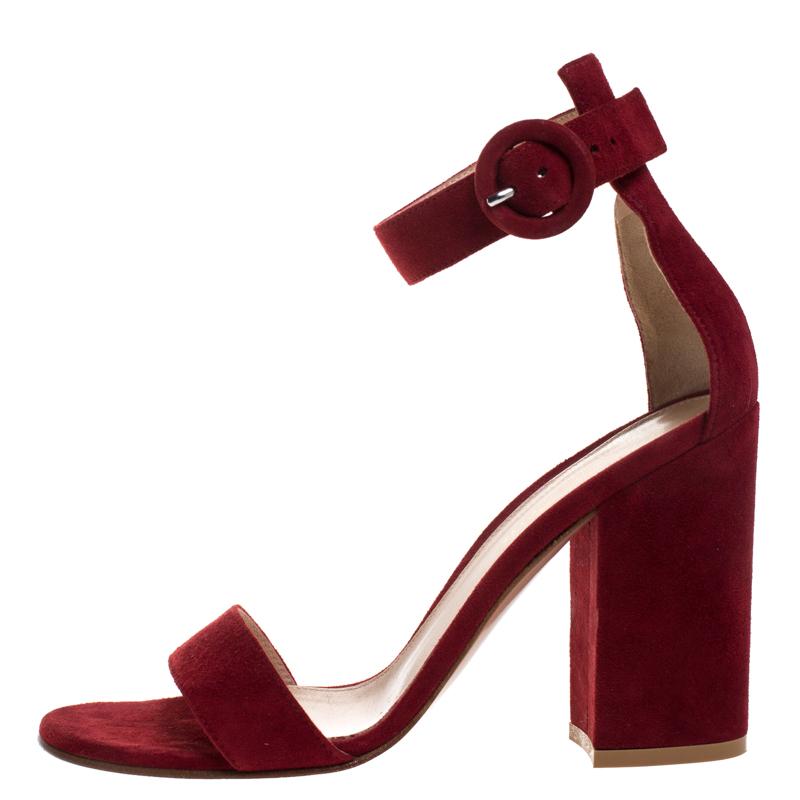 Mesmerizing sandals are a closet essential and there's no reason why yours must be left behind. No better place to start than with these ones from Gianvito Rossi! Carrying a single strap style, these red sandals are crafted from suede. Complete with