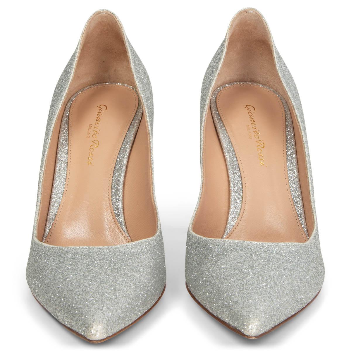 100% authentic Gianvito Rossi classic pointed-toe pumps in silver glitter embellished calfskin. Have been worn once and lost some glitter at the tip. Overall in excellent condition. Come with dust bag. 

Measurements
Imprinted Size	38.5
Shoe