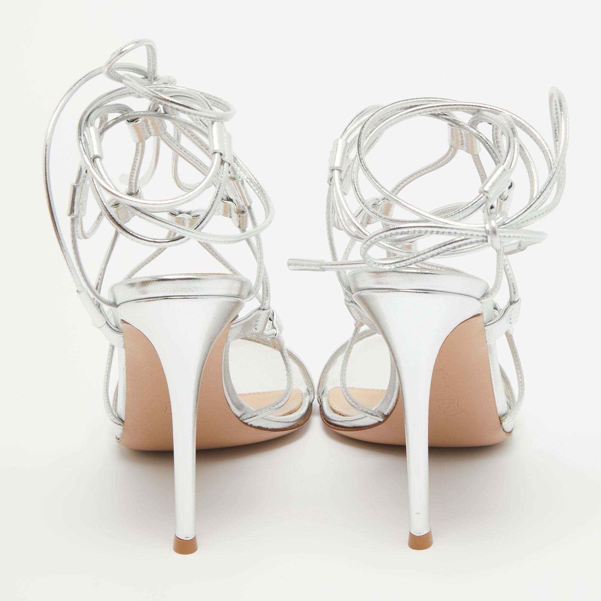 In classy silver leather, the Gianvito Rossi Giza sandals exude confident charm. Delicate straps gracefully embrace the foot, while a sturdy heel provides stability and style. With impeccable craftsmanship and timeless design, these sandals
