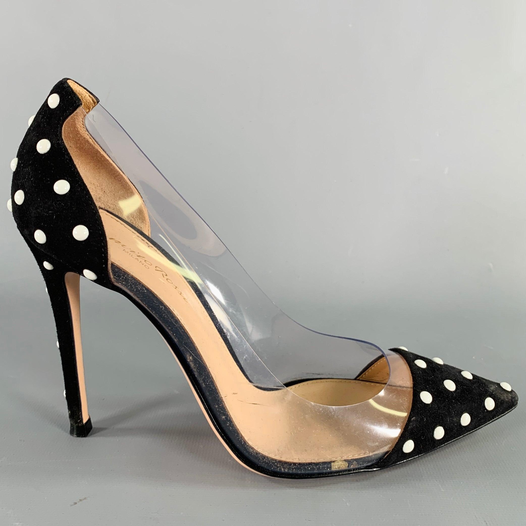 GIANVITO ROSSI pumps
in a black fabric featuring a raised white dots pattern, pointed toe, and stiletto design. Made in Italy.Very Good Pre-Owned Condition. Minor signs of wear. 

Marked:   37 

Measurements: 
  Heel: 3.75 inches 
  
  
 
Sui