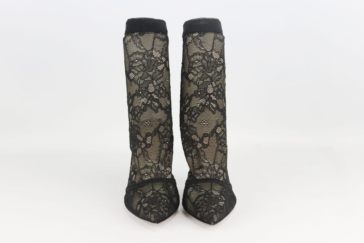 Gianvito Rossi stretch lace and suede ankle boots. Black. Pull on. Does not come with dustbag or box. Size: EU 38 (UK 5, US 8). Shaft: 6 in. Outersole: 9.6 in. Heel: 3.5 in 
