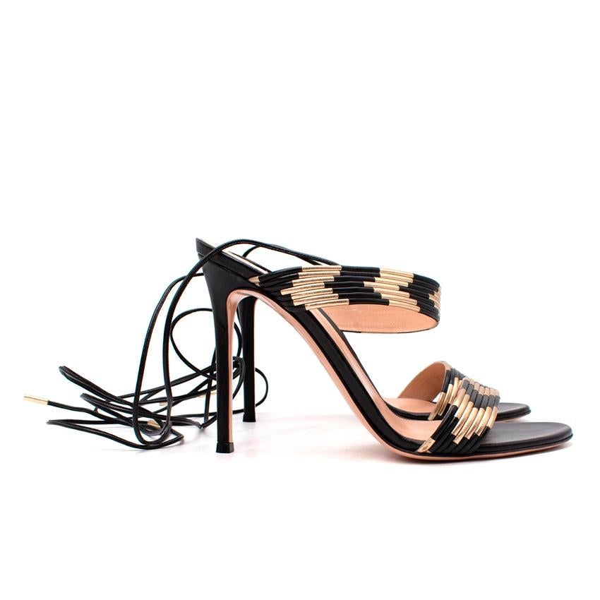 Gianvito Rossi Suni Black & Metallic Gold Leather Heeled Sandals
 

 - 2 front foot straps made from corded leather in a black & gold chervon pattern
 - Wrap around narrow ankle ties of black corded leather, with gold-tone metal finished ends
 - Set