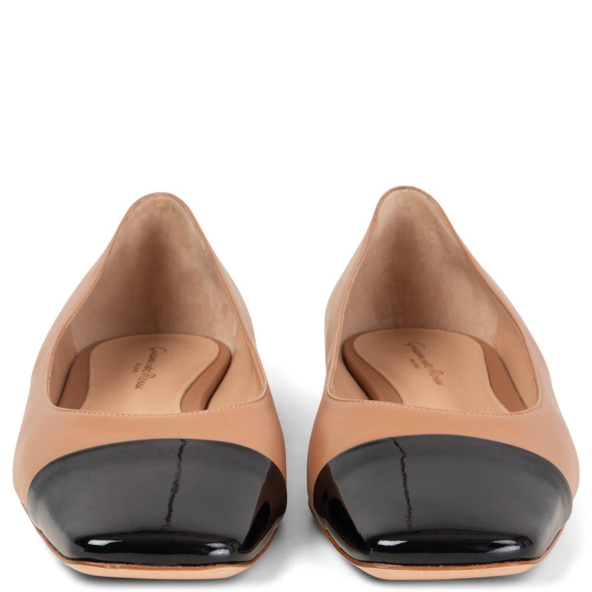 100% authentic Gianvito Rossi Ballet Flats with a square toe in tan leather with a black patent leather cap. Brand new. 

Measurements
Imprinted Size	42
Shoe Size	42
Inside Sole	28cm (10.9in)
Width	8.5cm (3.3in)
Heel	1cm (0.4in)

All our listings