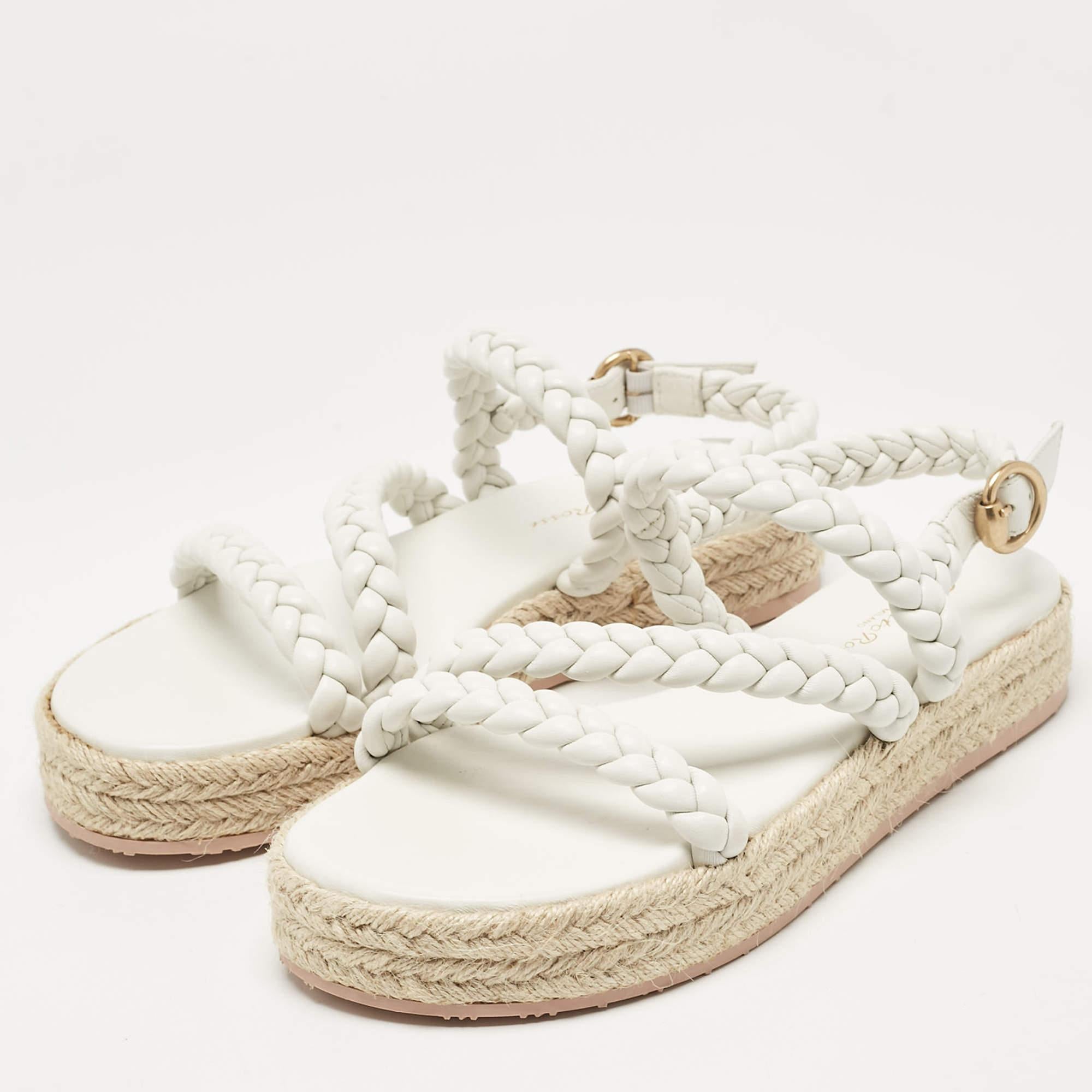 These designer espadrilles exude cool summer vibes while giving all the comfort to your feet. They bring along a well built silhouette and the houses signature aesthetics. Wear them with anything: jeans dresses shorts.