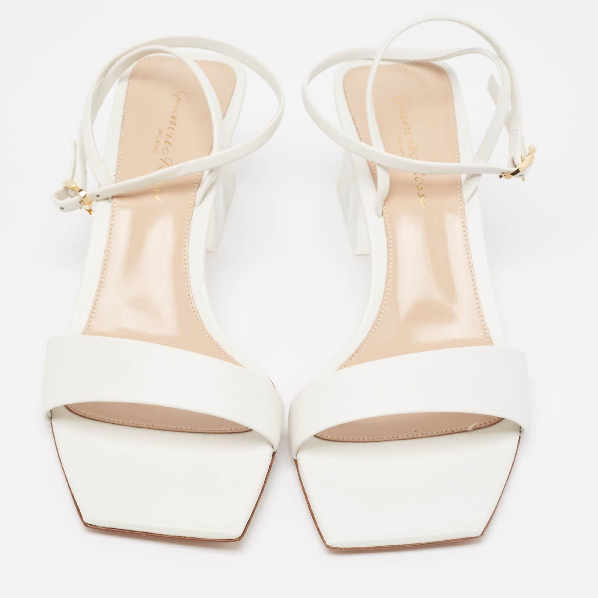 These Gianvito Rossi sandals will offer you both luxury and comfort. Made from quality materials, they come in a classy white with 5.5 cm clear heels.

Includes: Original Dustbag, Original Box, Info Card


