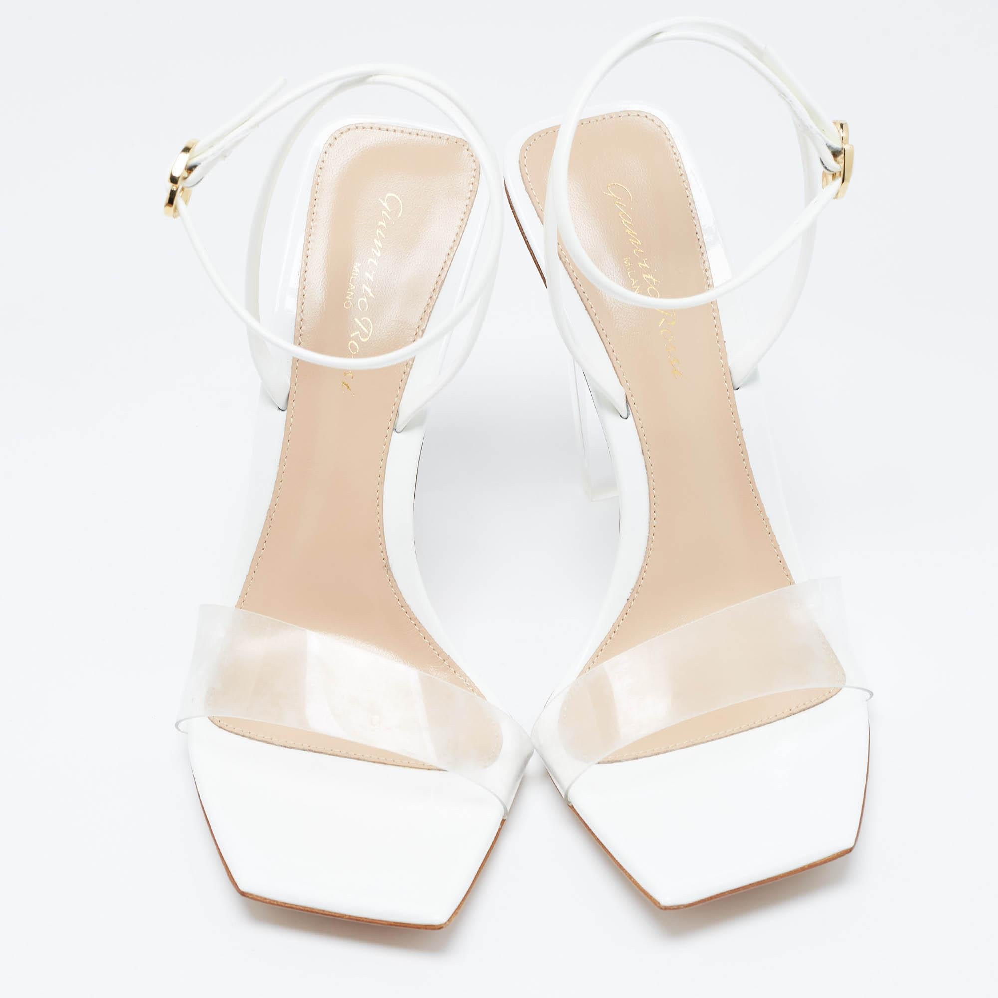 Crafted by Gianvito Rossi, the Odyssey sandals epitomize modernity. The blend of patent leather and transparent PVC creates an illusion of weightlessness, while the sleek silhouette exudes understated elegance. These sandals effortlessly elevate any