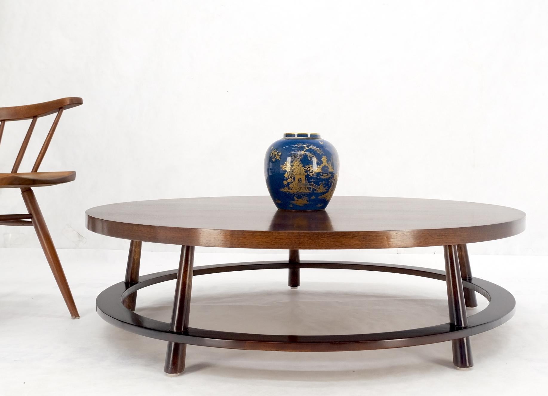 Gibbings for Widdicomb Mid-Century Modern round walnut coffee table tapered legs.