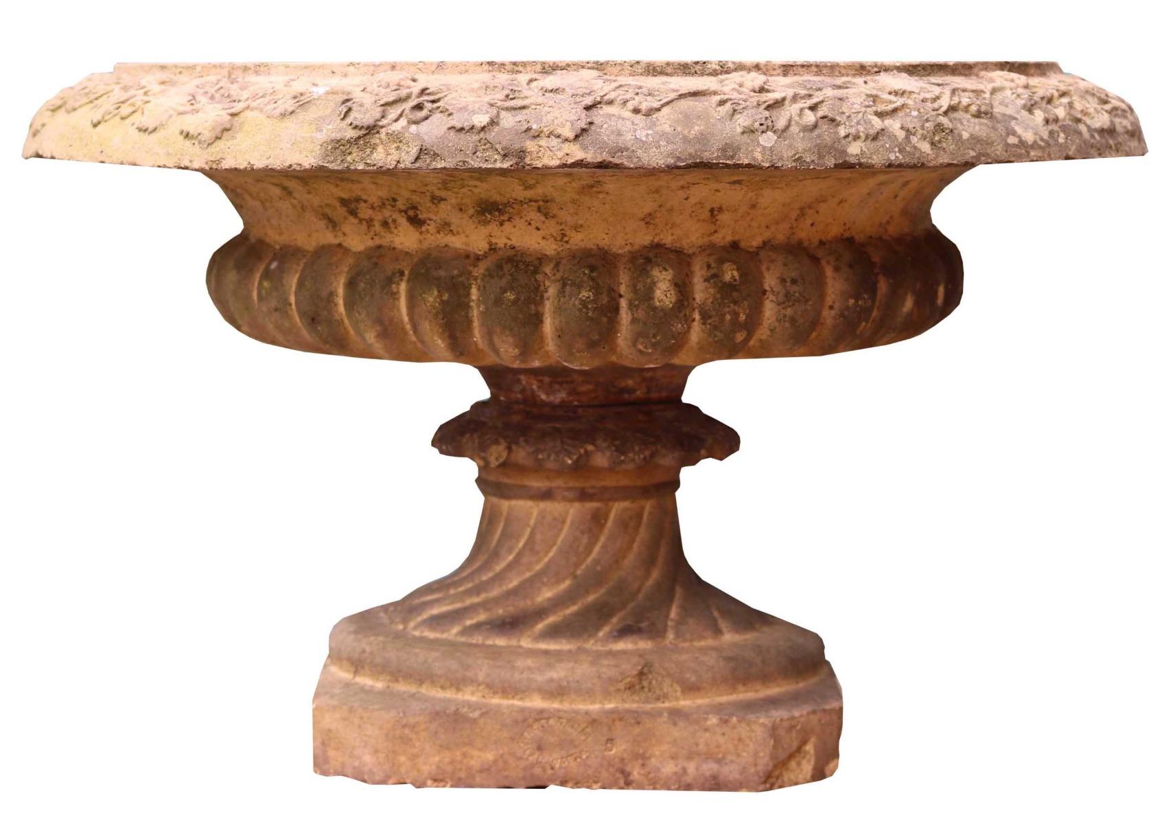 An antique Gibbs and Canning shallow Tazza Urn. Bearing a makers stamp to the base of the socle.

Additional Dimensions:

Diameter 54.5 cm

Base 25 x 25 cm.