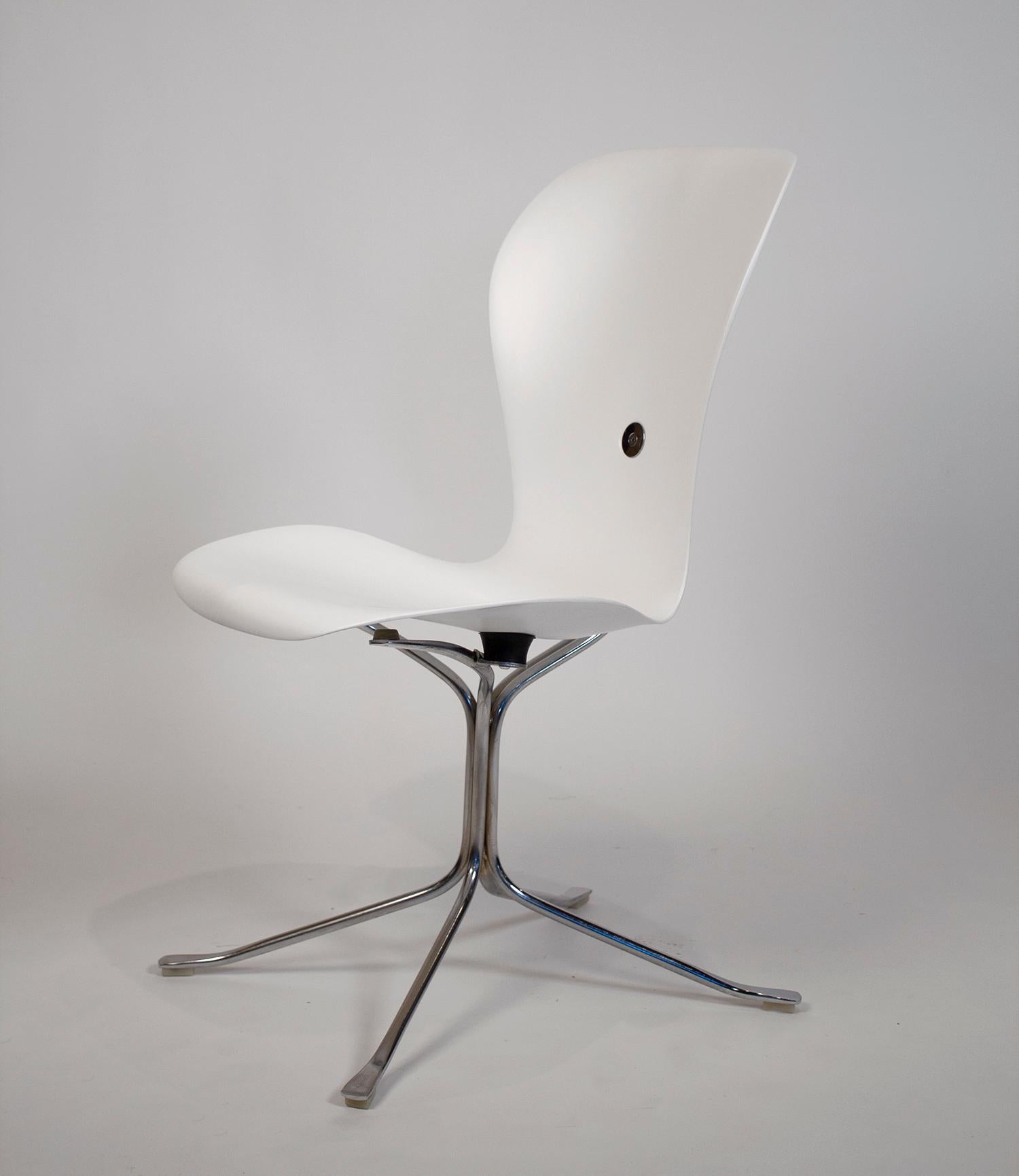 The Ion chair, also known as the space needle chair, was designed for the observation deck of the space needle at the Seattle World's fair in 1962. This set of six chairs was professionally painted in a flat crisp white lacquer and is in excellent