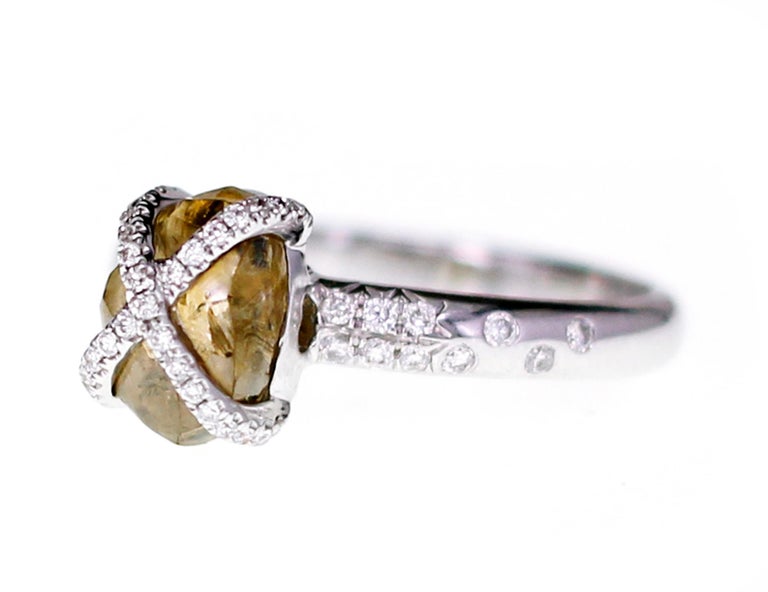 2.36 carat of Brown Rough Diamond wrapped with 0.22 carat of white round brilliant diamond. Raw and Organic Jewelry has been the trend for a while