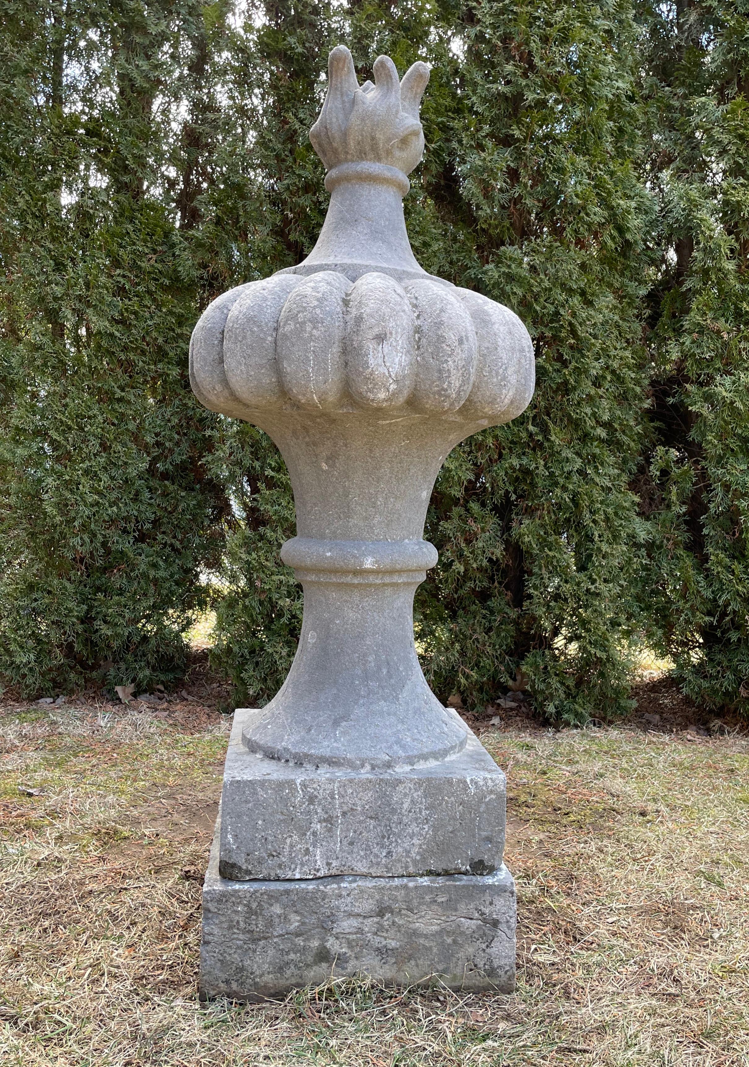 This incredible flame finial, along with three identical smaller ones (FBF 1073 and 1074), once graced a private castle just outside of Nemur, Belgium. Exceptional in all respects, it is deeply and crisply carved, with an intricate flame rising from