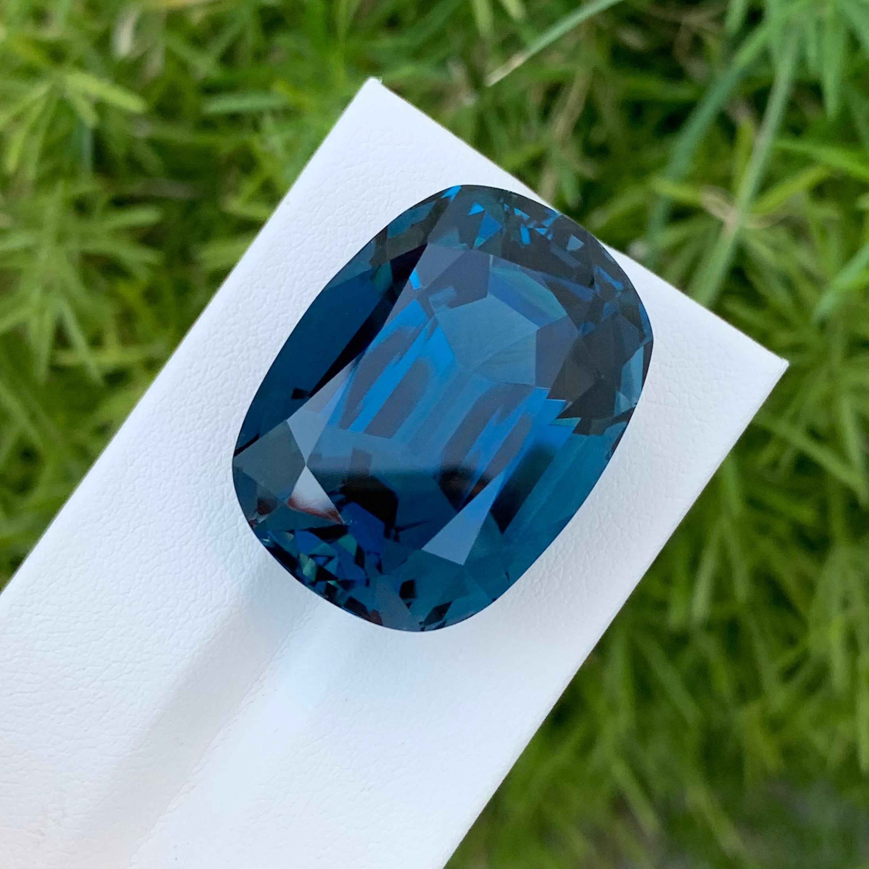 Loose London Blue Topaz

Weight: 80.80 Carats
Dimension: 27 x 21 x 16.5 Mm
Origin: Brazil
Shape: long Cushion
Color: Deep Blue
Certificate: On Customer Demand

London Blue Topaz is a mesmerizing variety of topaz renowned for its deep and enchanting