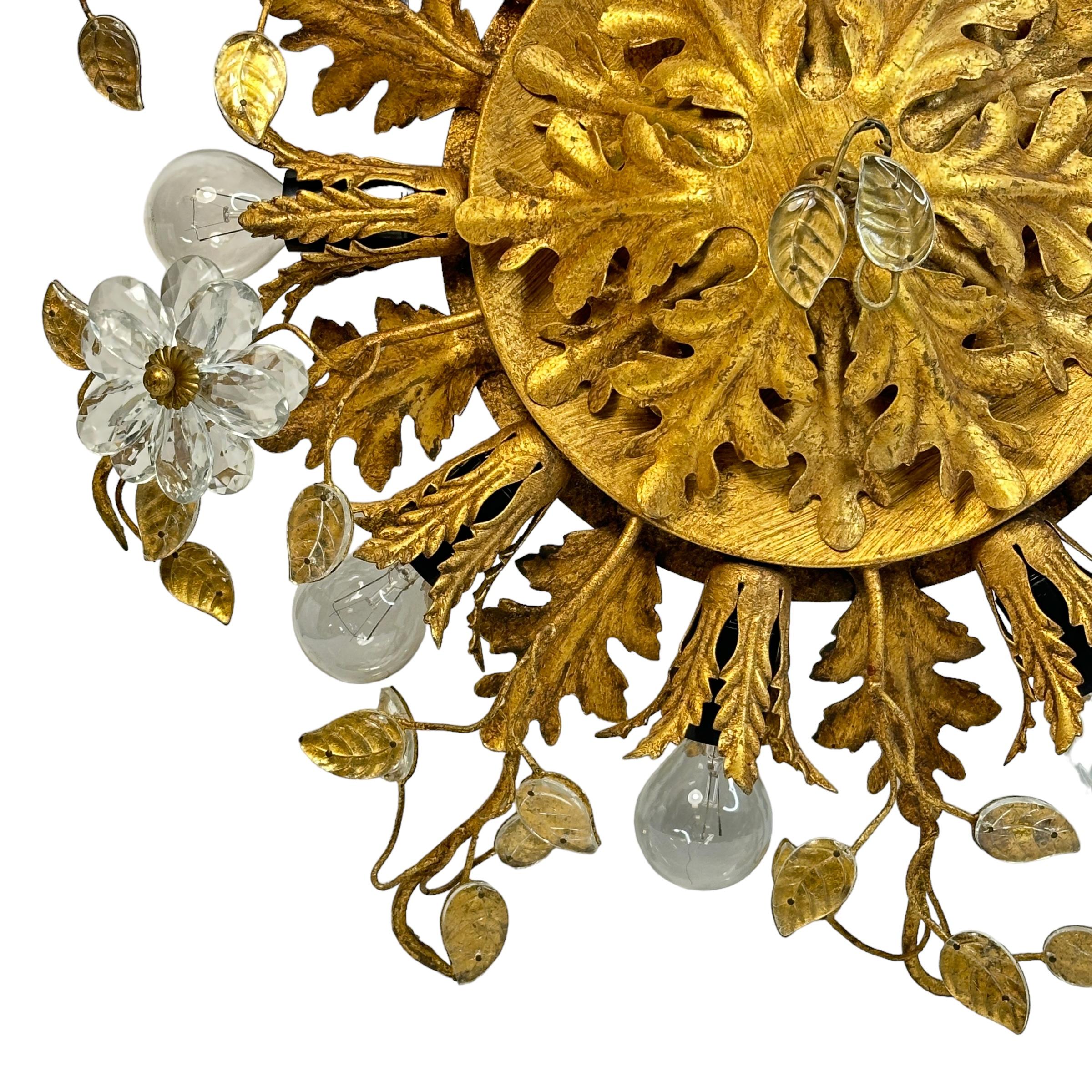 Add a touch of opulence to your home with this charming flush mount light. Perfect stunning gilt acanthus leaf design with clear Murano glass flowers and Murano glass leaves on fine gilt stems, to enhance any chic or eclectic home. We'd love to see