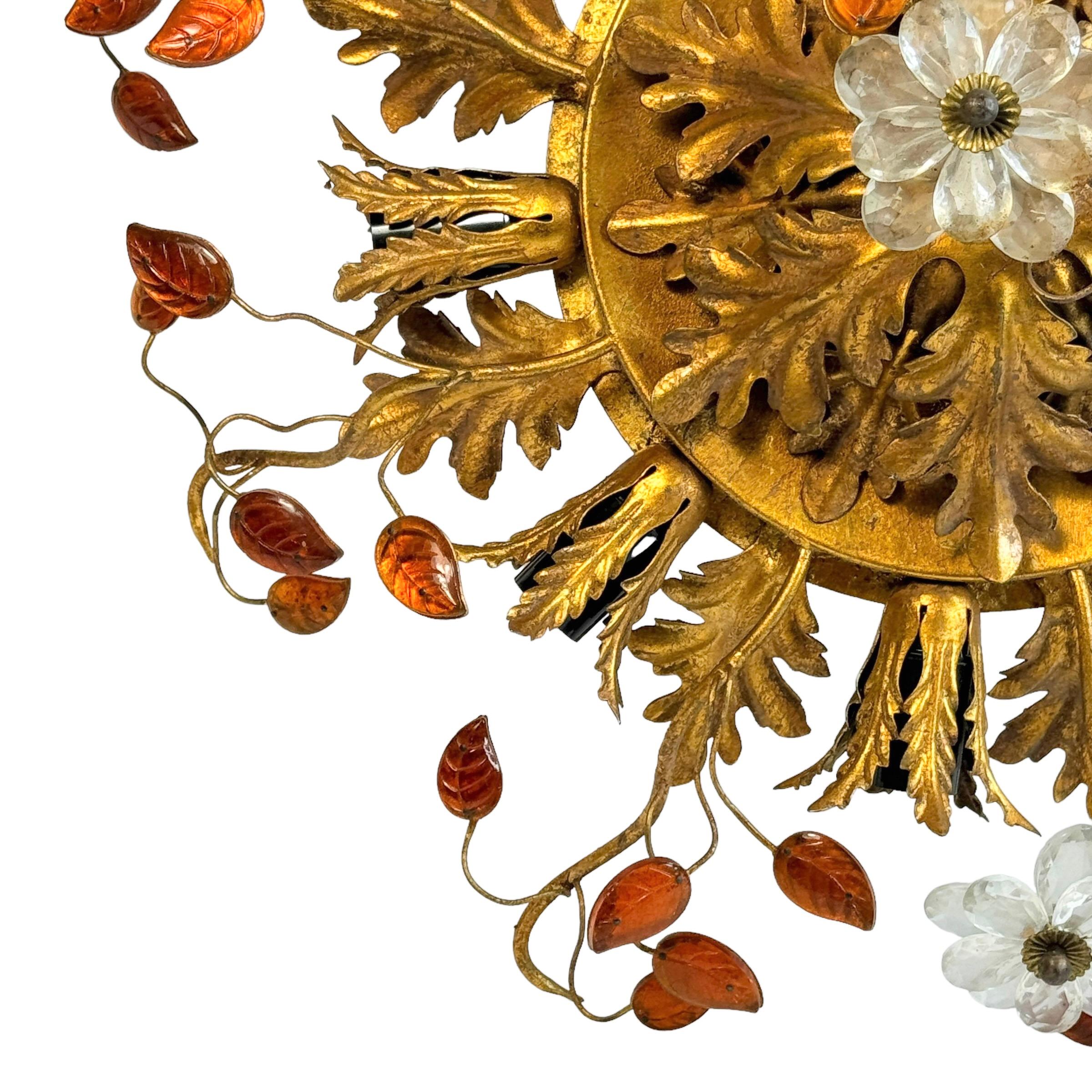 Add a touch of opulence to your home with this charming flush mount light. Perfect stunning gilt acanthus leaf design with clear Murano glass flowers and green Murano glass leaves on fine gilt stems, to enhance any chic or eclectic home. We'd love
