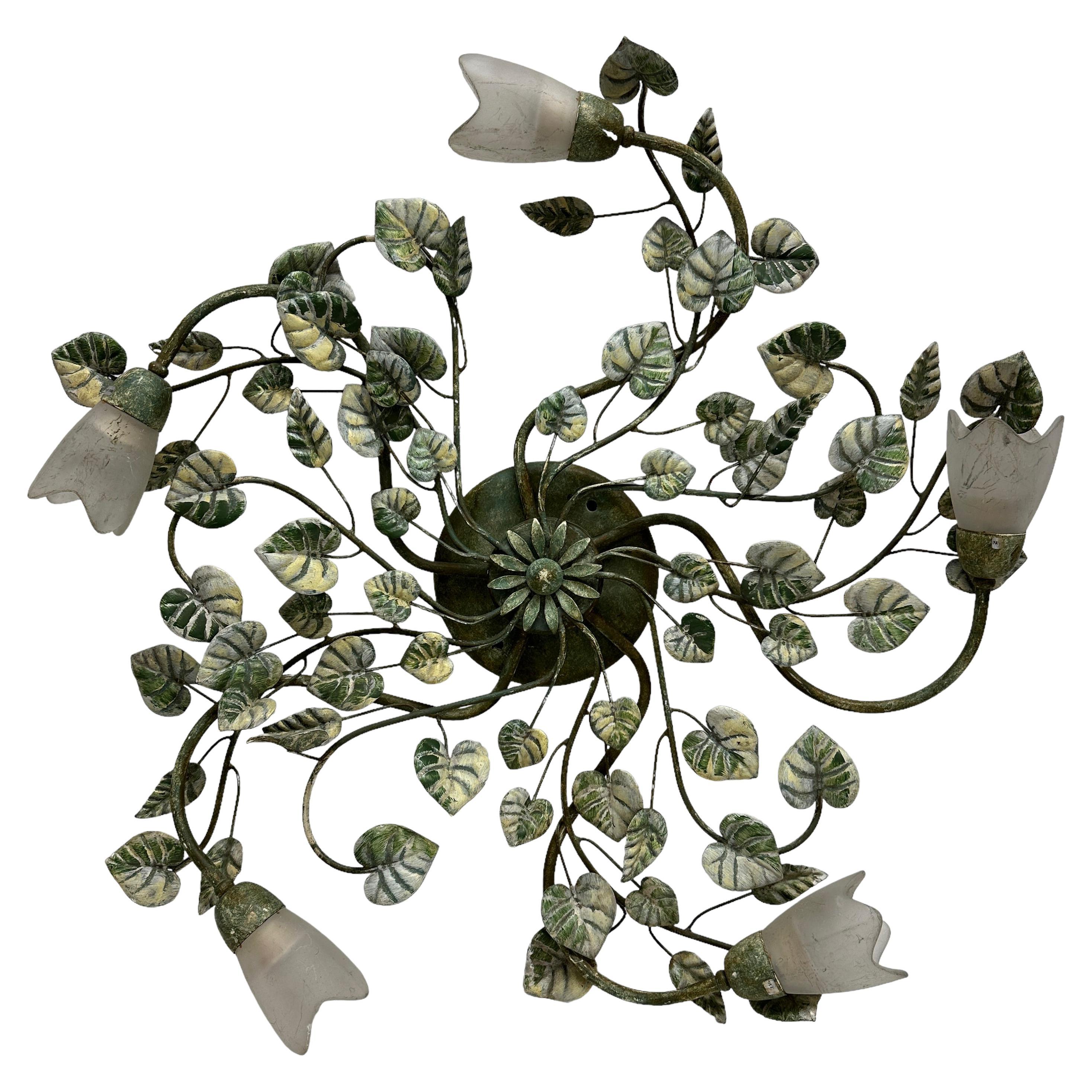 Add a touch of opulence to your home with this charming flush mount light. Perfect stunning colored design with glass shades and hand painted leaves on fine stems, to enhance any chic or eclectic home. We'd love to see it hanging in an entryway as a