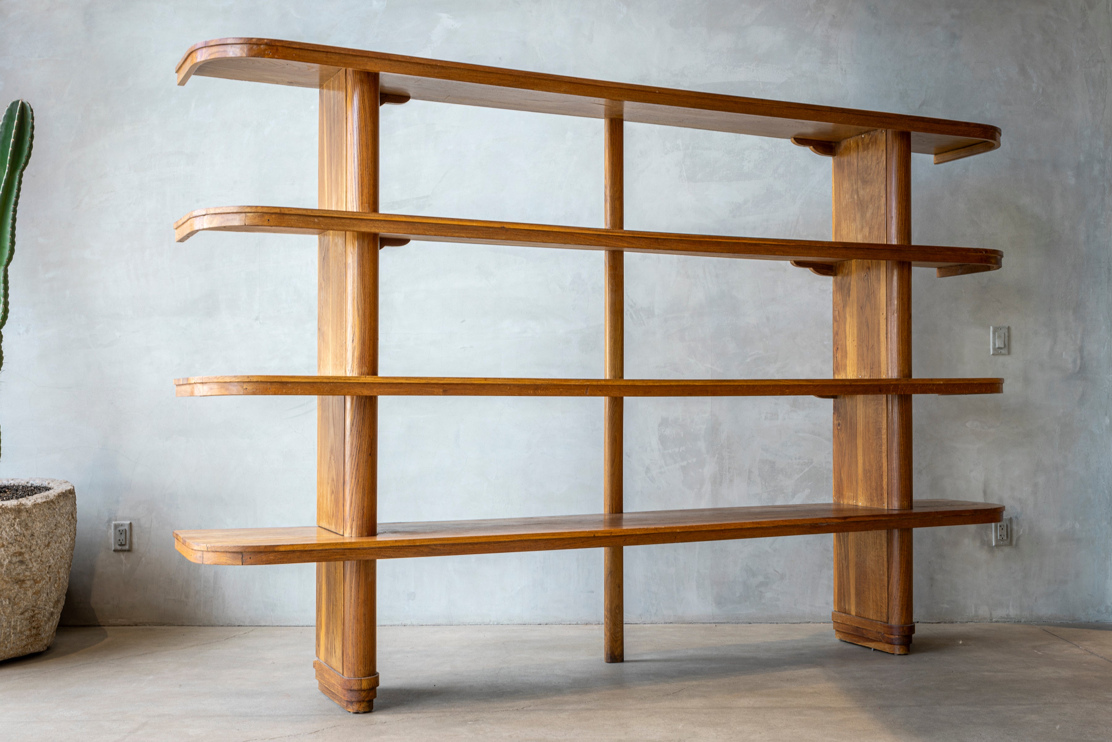 Massively large Italian bookcase - Italy, 1960s
Impressive in scale and construction. 
Wonderful rich oak patina with curved ends