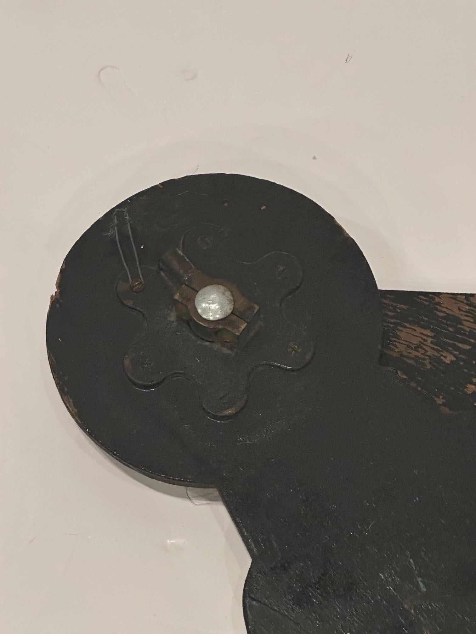 Wonderful found object art in these rustic carved wood clock tower hands, monumental in scale, and having some vestiges of the original worn paint.

Large hand is 54” w
Smaller 39.5 w