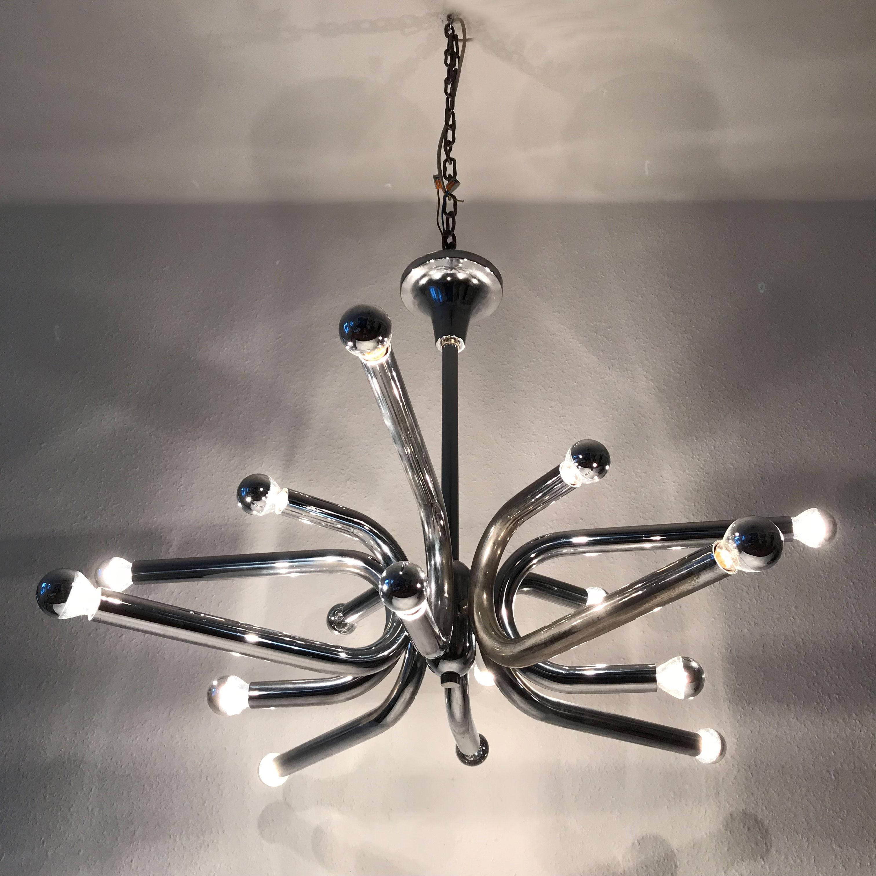 Gorgeous and gigantic Mid-Century Modern 16-armed Sputnik chandelier or ceiling lamp. Manufactured in 1960s by Gebrüder Cosack, Neheim-Hüsten, Germany. Executed in solid chrome-plated steel tubes and sheet. 

The chandelier needs 16 x E14 Edison