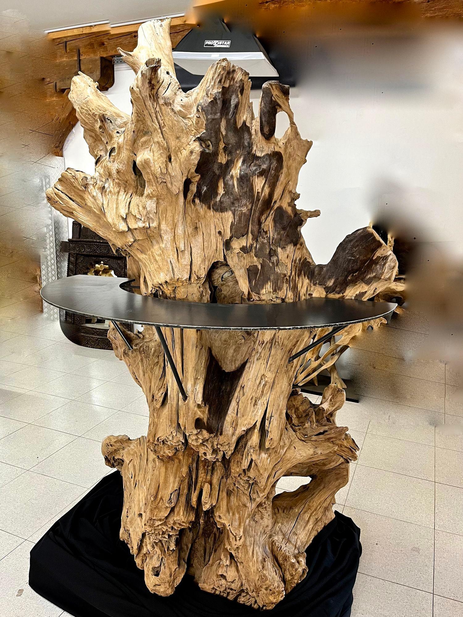 Unique looking, gigantic (height is almost 7.5 ft) teak root stand-up bar with an outstanding organic modern (but natural grown) shape from the beautiful island state of Java/ Indonesia. Designed by a very talented artist, this extraordinary bar has