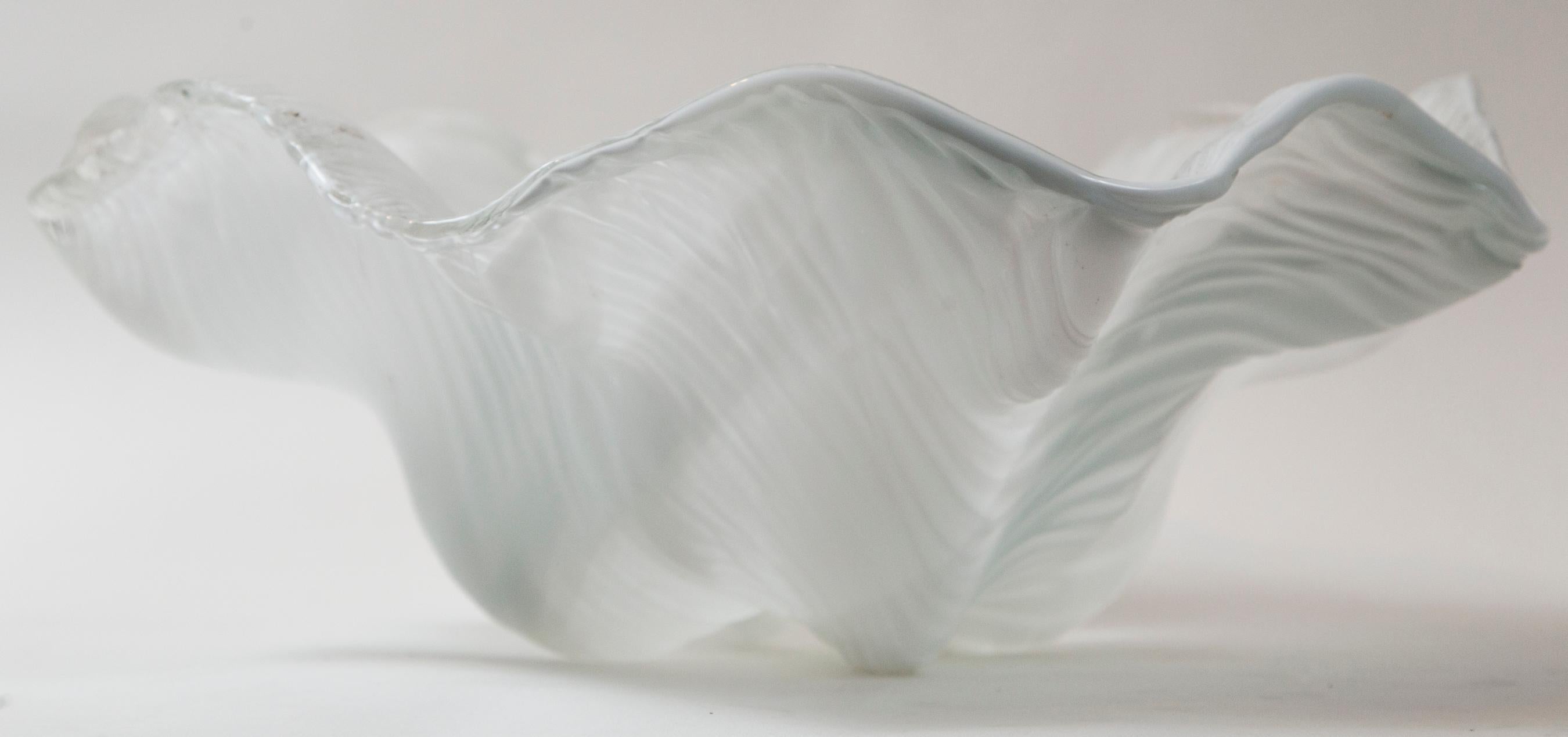 Large centerpiece shell bowl by Toni Zuccheri for Venini, from his Ninfee series
Incised signature to underside: [Venini Italia].
Technique of glass is pasta vitrea which is a colored opaque glass that has the effect of a ceramic.

Date: