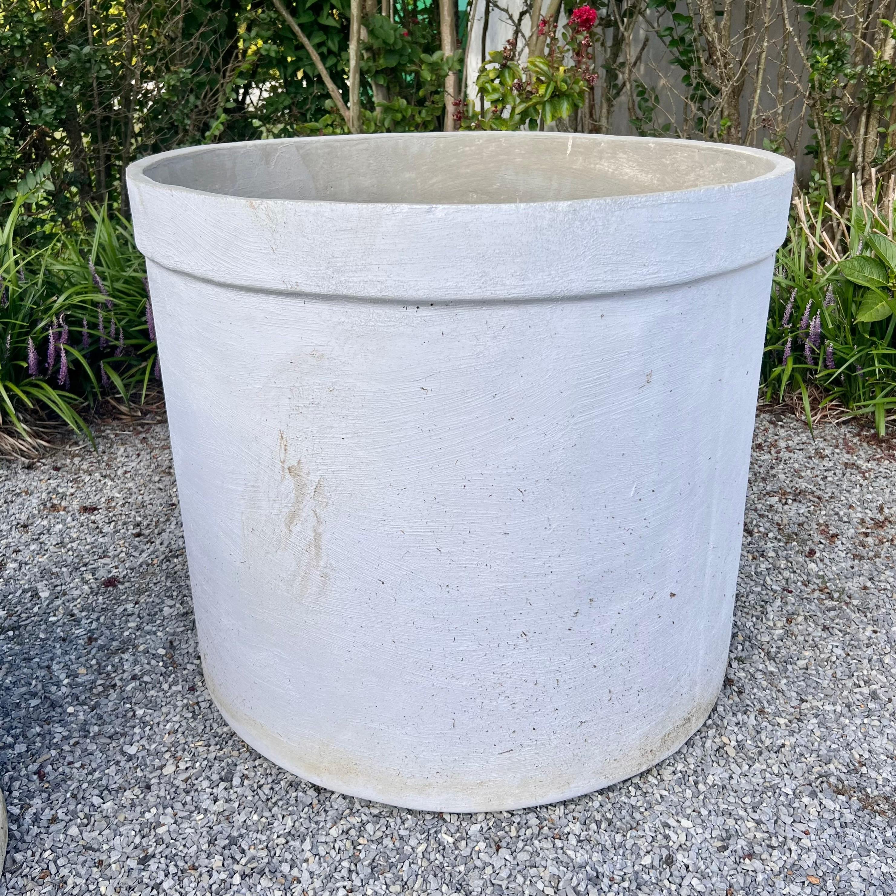 Gigantic tree planter by the Swiss design house Eternit. Extremely difficult to find vintage planters large enough to plant and hold a large tree. This would make a wonderful and functional piece for your home or garden. Painted greyish/white on its