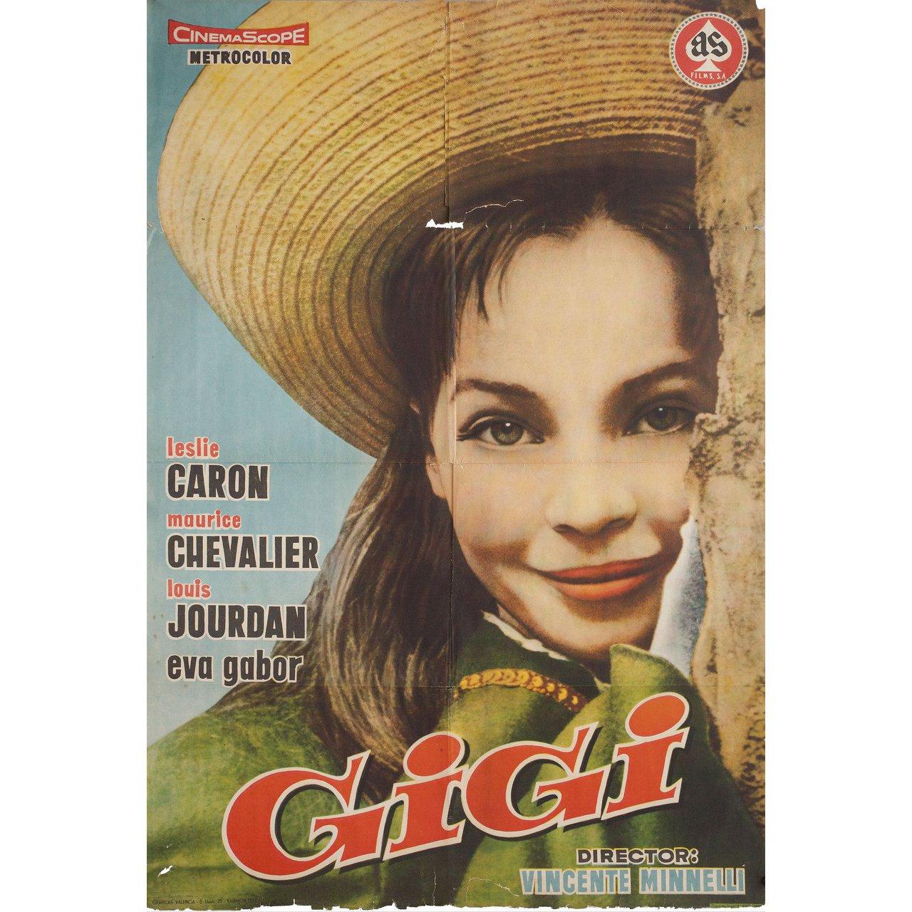 Original 1959 Spanish B1 poster for the film Gigi directed by Vincente Minnelli with Leslie Caron / Maurice Chevalier / Louis Jourdan / Hermione Gingold. Fair-good condition, folded. Many original posters were issued folded or were subsequently