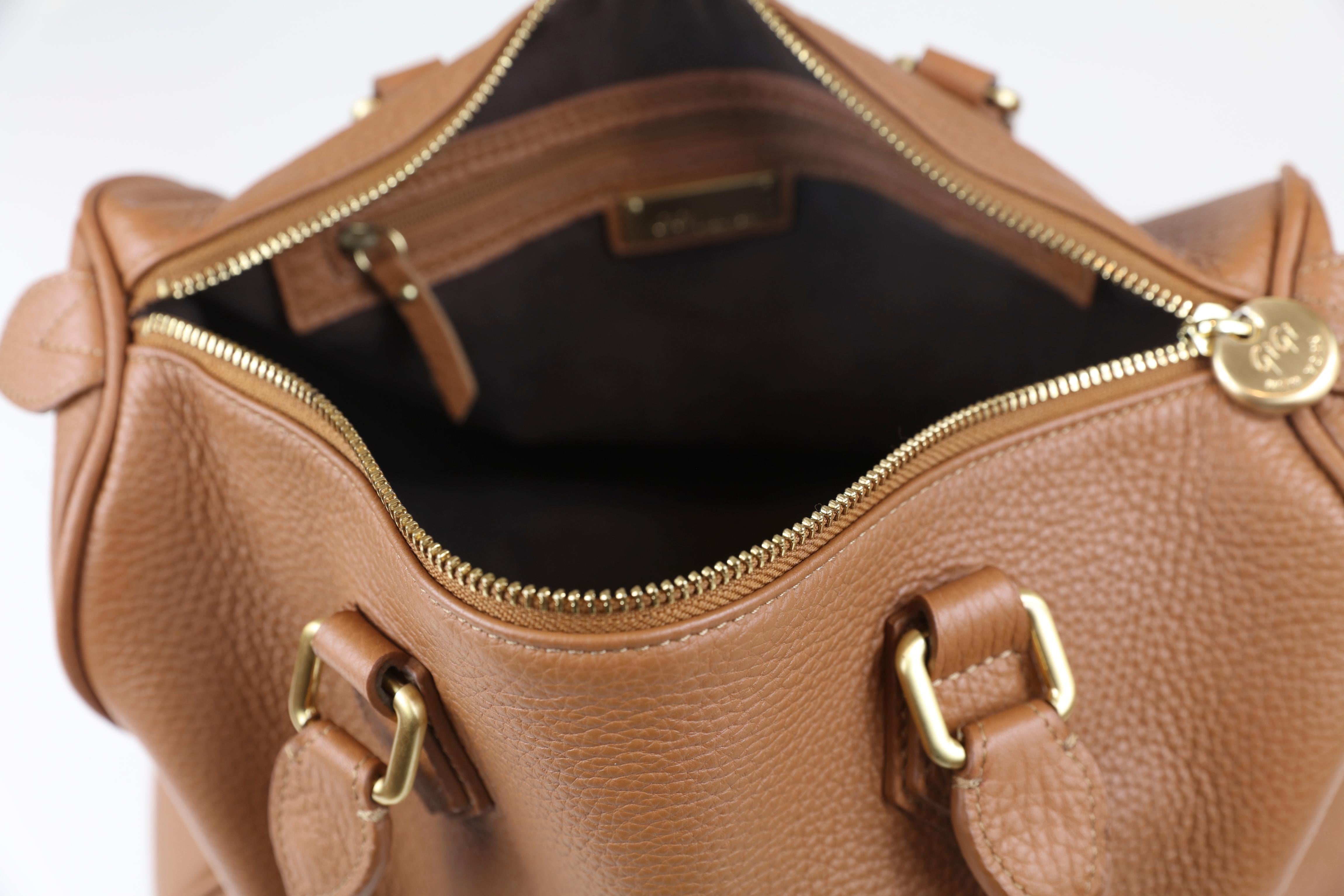 bag with brown leather handles