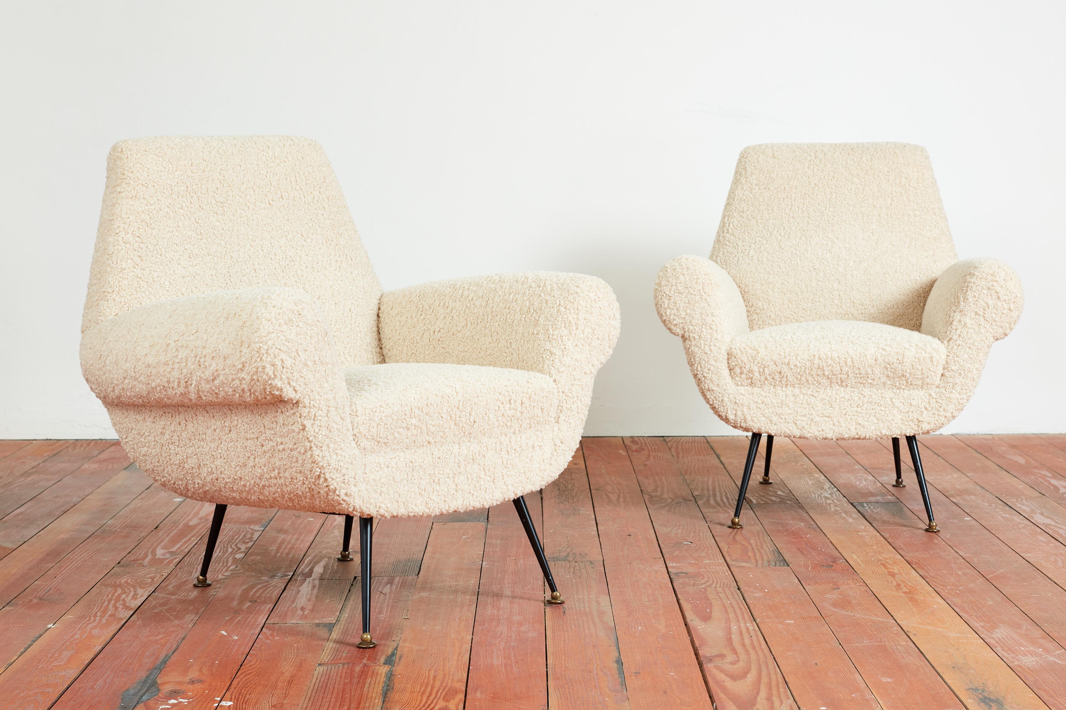 Pair of Gigi Radice armchairs for Minotti - Italy, 1950s
Reupholstered in creamy colored wool boucle with original iron legs and brass feet.
Great curved shape 
Matching sofa available.