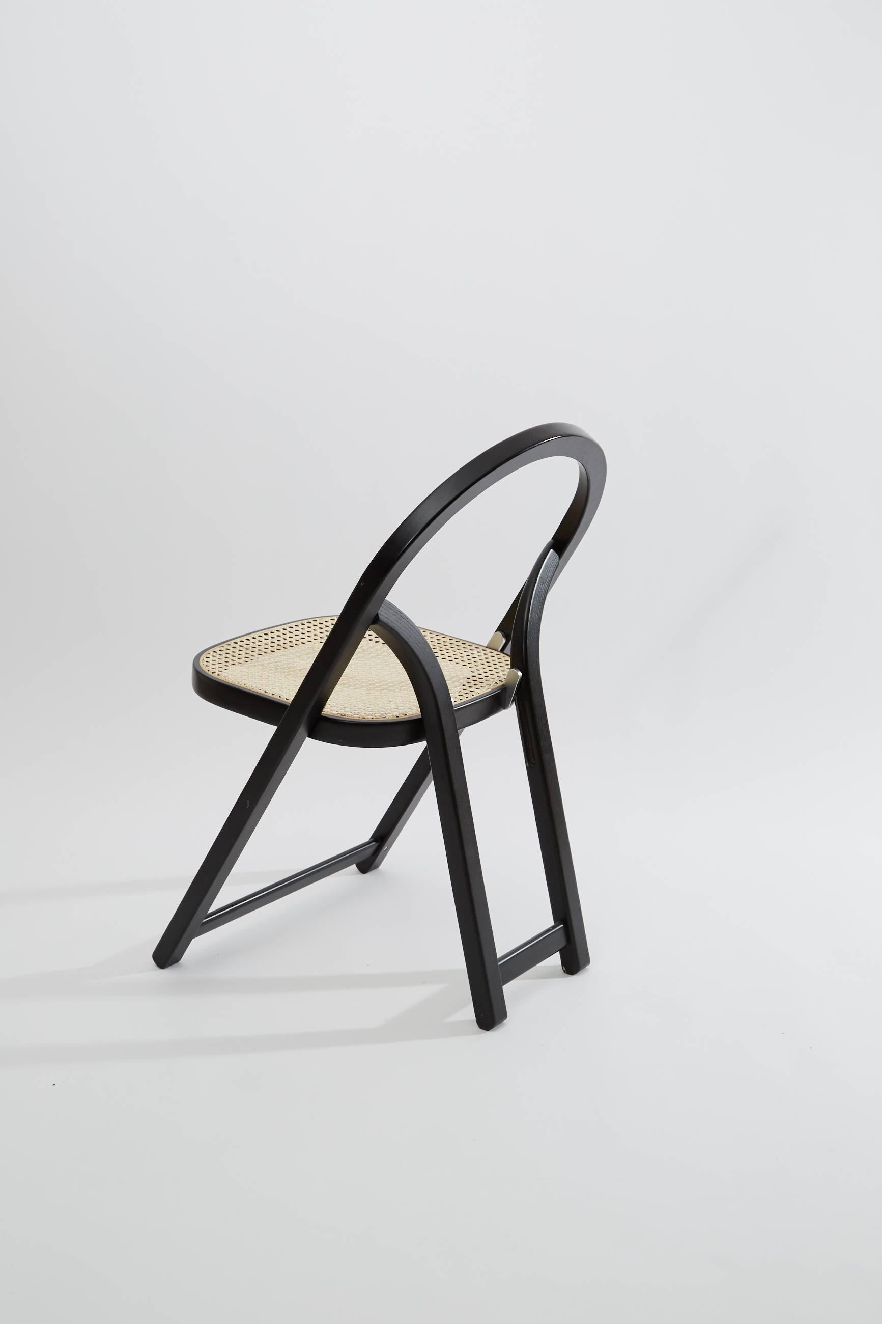 Late 20th Century Gigi Sabadin Crassevig Arca Folding Chair in Black Wood and Natural Rattan, 1974 For Sale