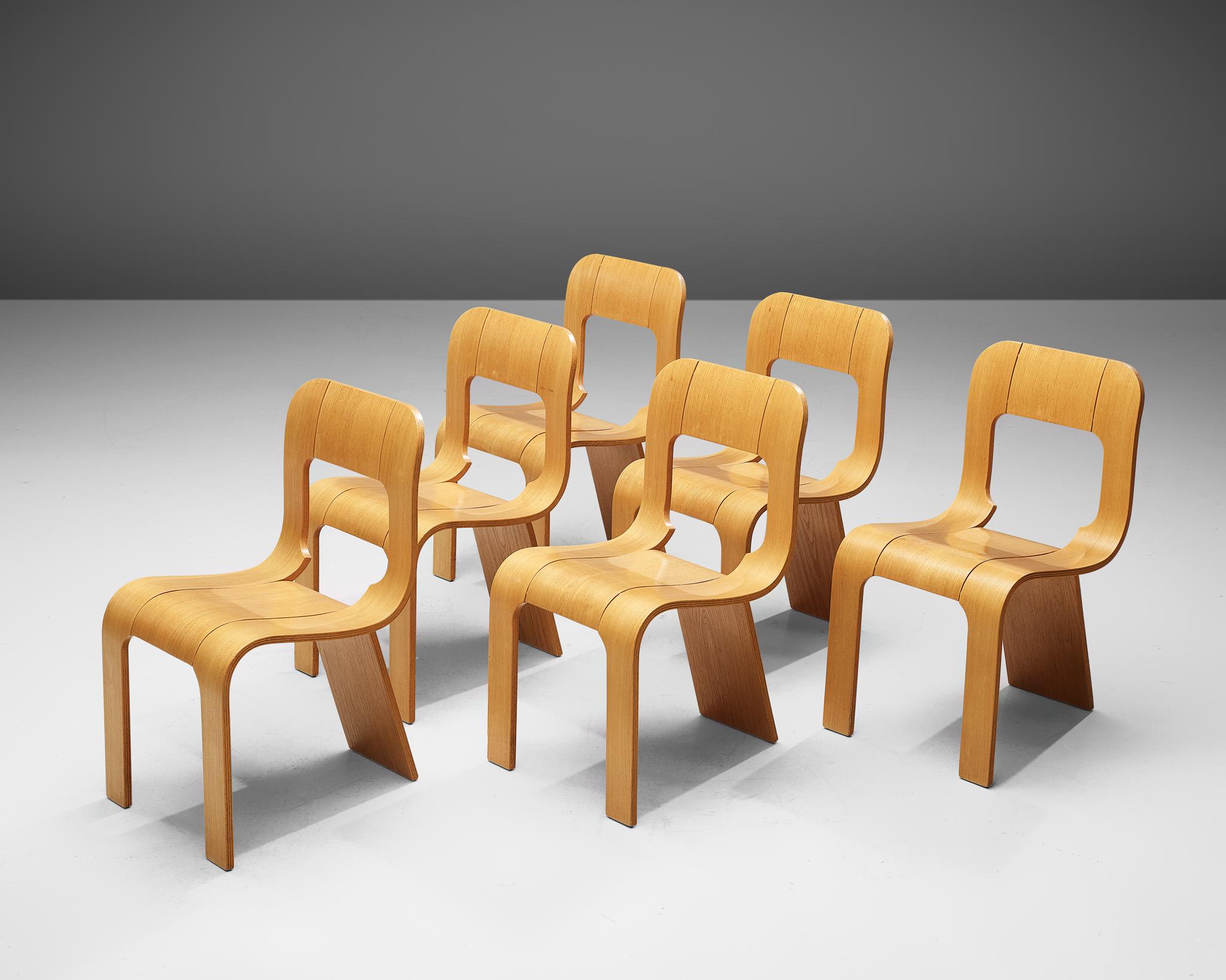 Gigi Sabadin for Stilwood, set of six chairs, plywood, Italy, 1970s.

An inventive design by the Italian Gigi Sabadin, these chairs are made of bent plywood with a veneered finish. The organic design seems to be made of one piece, which is cut and