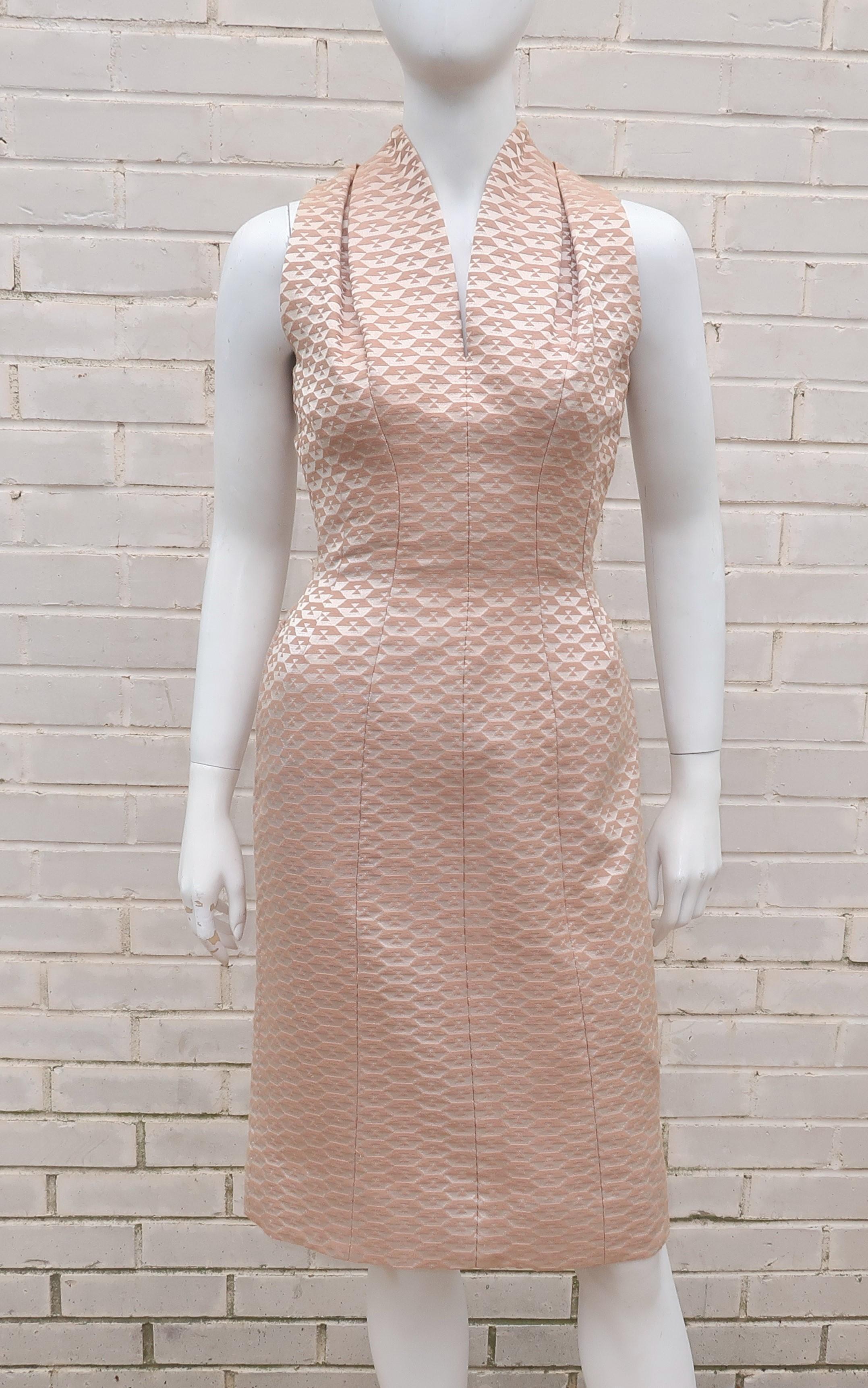Bombshell alert!  GiGi Young (Suzy Perette's trendier line) creates a brocade cocktail dress with a form fitting silhouette and eye catching graphics.  The fabric offers a champagne satin finish which is offset by a nude shade of beige all with a