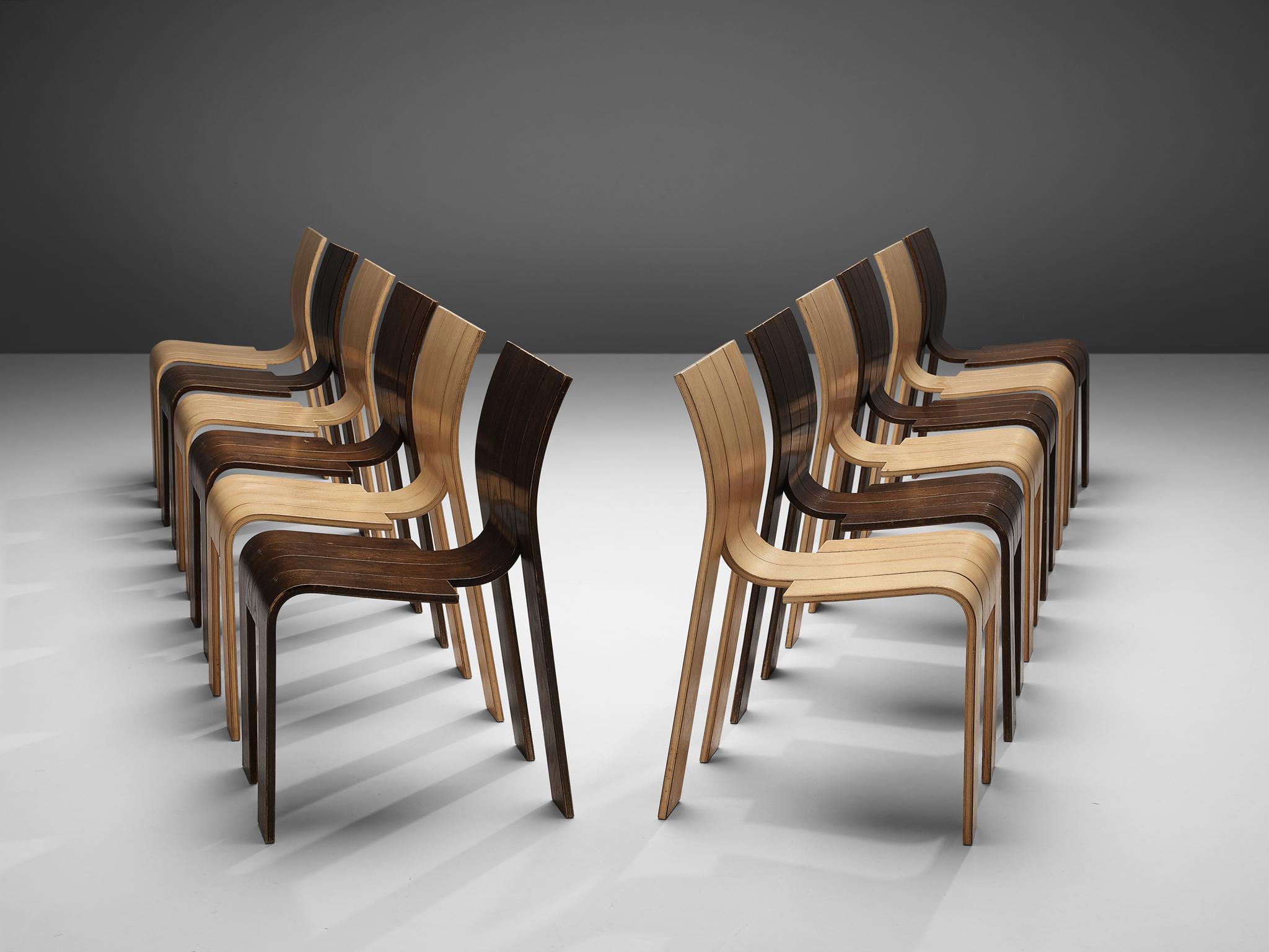 Gijs Bakker for Castelijn, bicolor set of twelve 'Strip' dining chairs, wood, the Netherlands, 1974

An inventive design that consists of four curved strips that are connected to each other in without any joints. The curved strips form together a