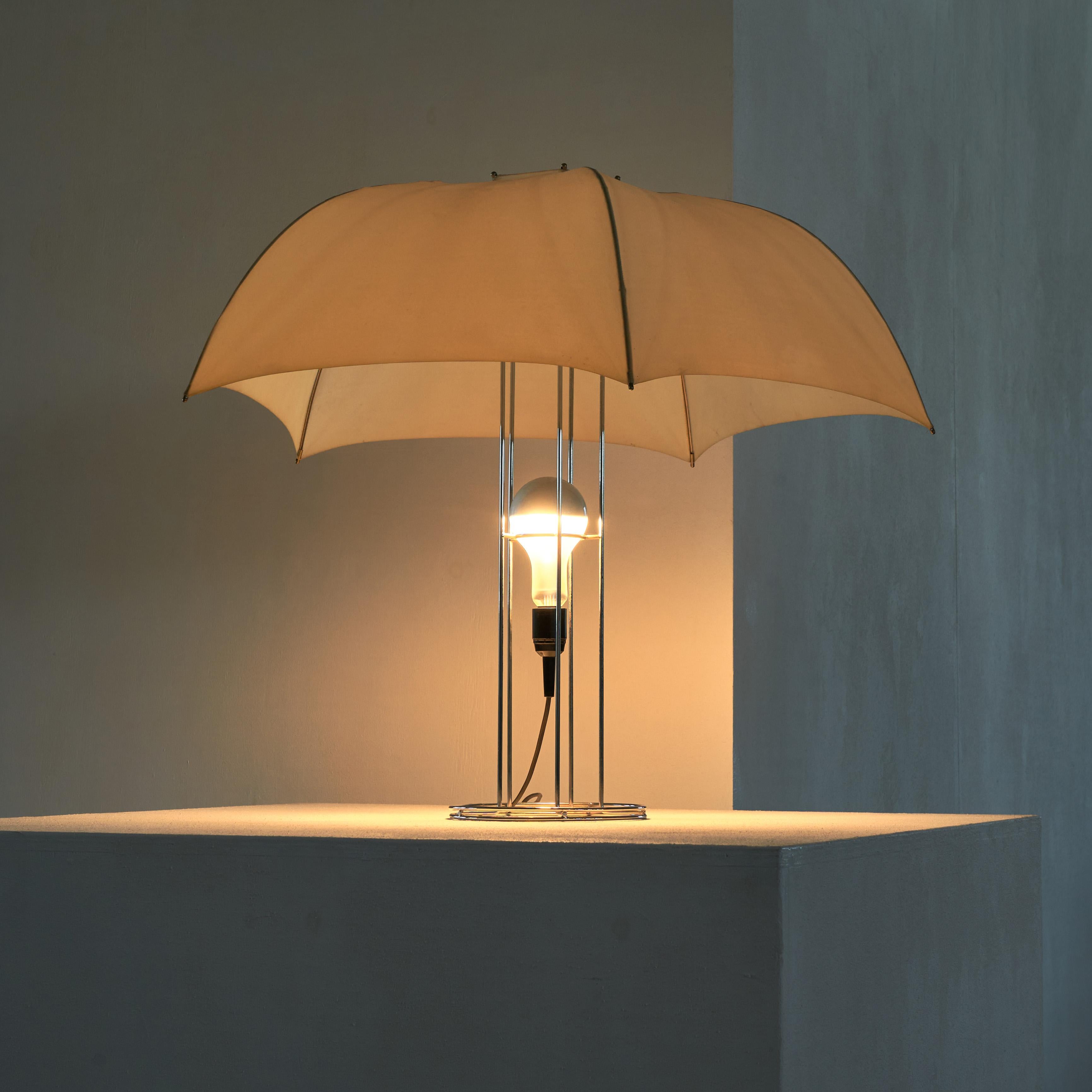 Gijs Bakker umbrella table lamp for Artimeta, The Netherlands 1973.

This is one of the most iconic pieces by Dutch furniture and jewelry designer Gijs Bakker (1942) for Artimeta. It is a fun and interesting piece which obviously makes a reference