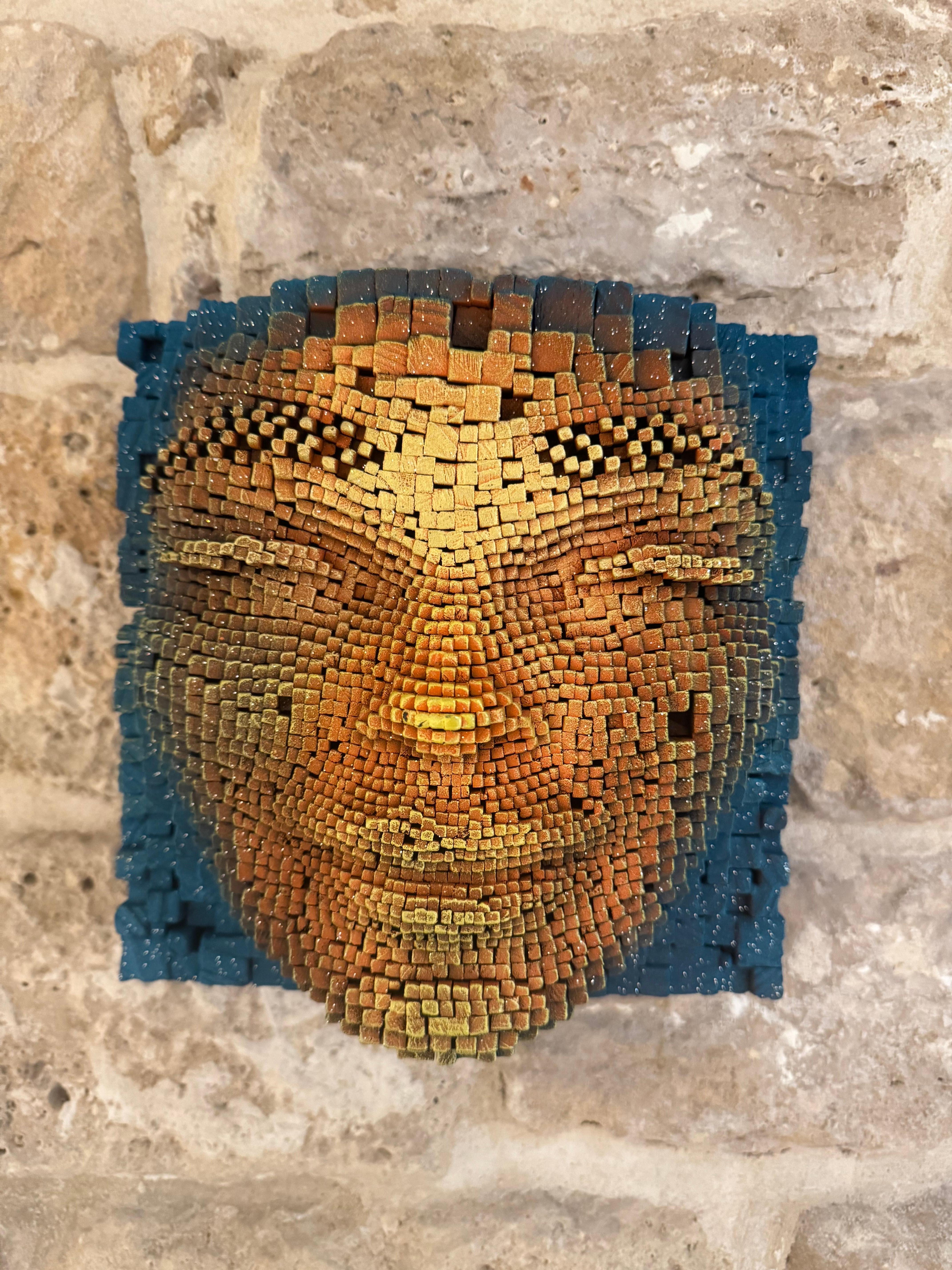 Wall sculpture - stacked and painted wood sticks, acrylic paint.

Unique and original wall sculpture by Gil Bruvel. 
From the iconic Mask sculpture series.  
Gil Bruvel is a visual artist who was born in 1959 in Sydney, he lives and works in