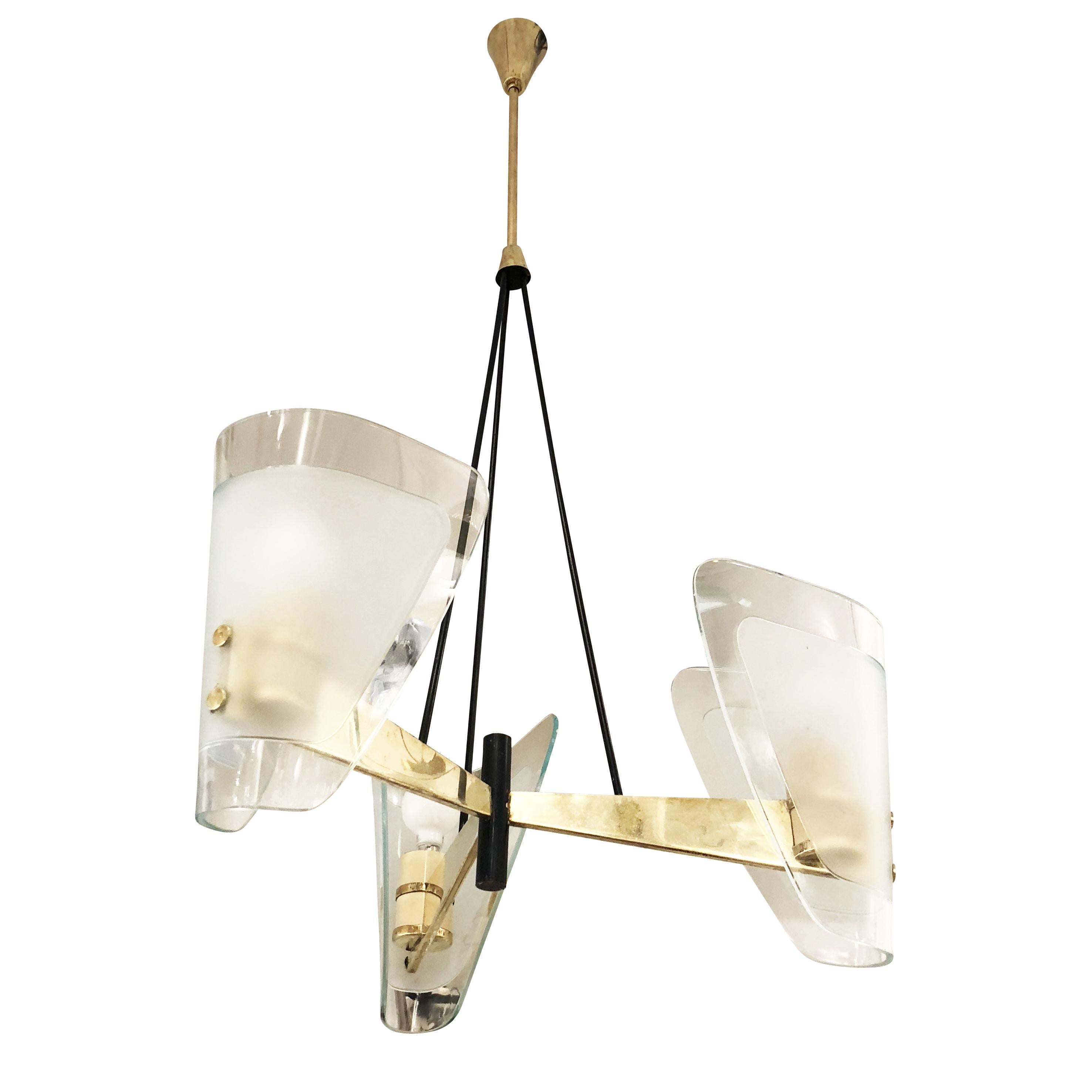 Italian midcentury chandelier by Gilardi and Barzaghi with a brass frame and three curved glass shades. Holds three E26 Sockets. Height of stem is adjustable.

Condition: Excellent vintage condition, minor wear consistent with age and