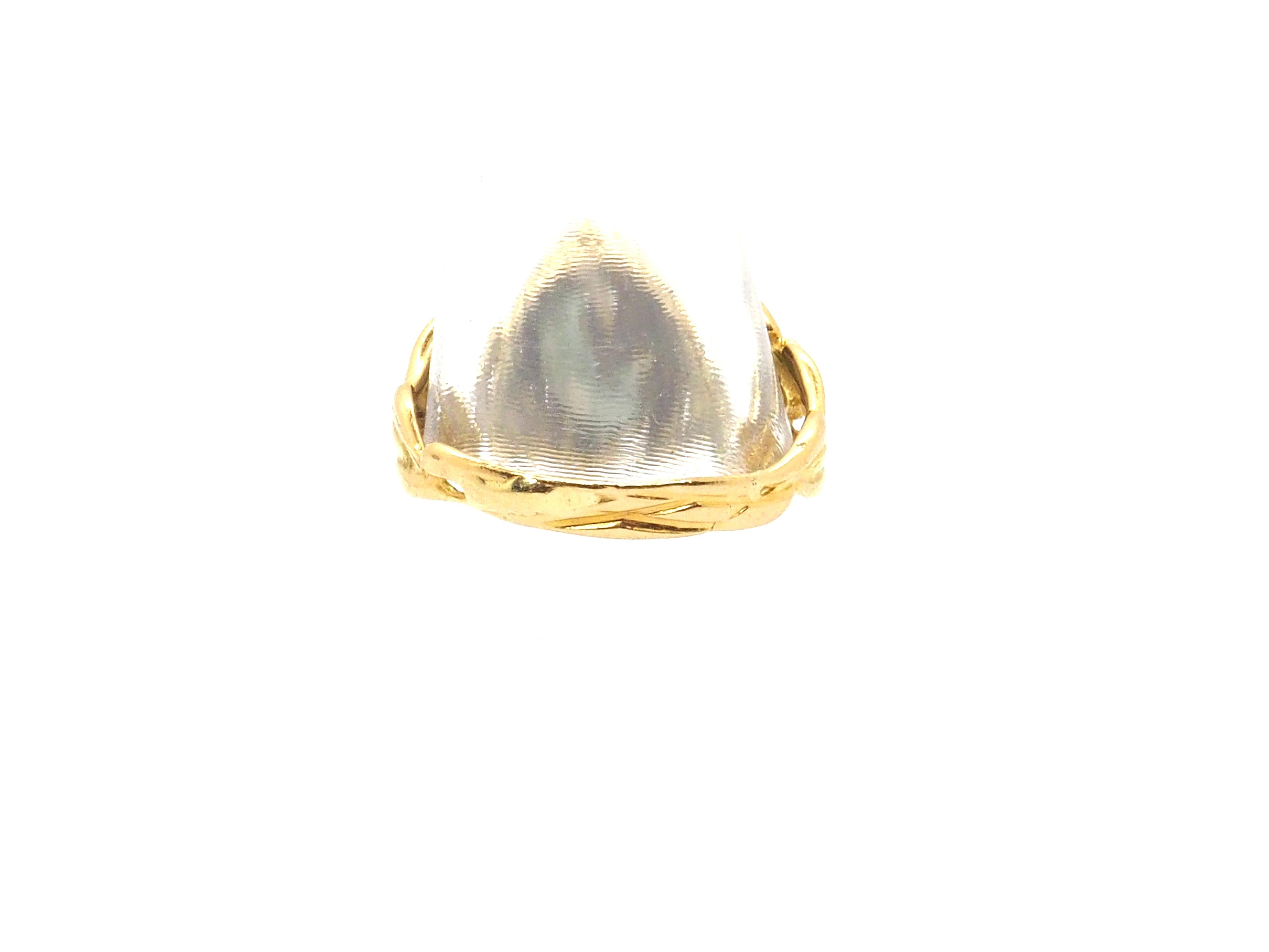 This rare ring made and designed for Gilbert Albert is part of his famous jewellery collection where the balls are interchangeable and thus be able to create different styles with the same jewel. 

Centre stone ring  made in18 karats yellow gold.