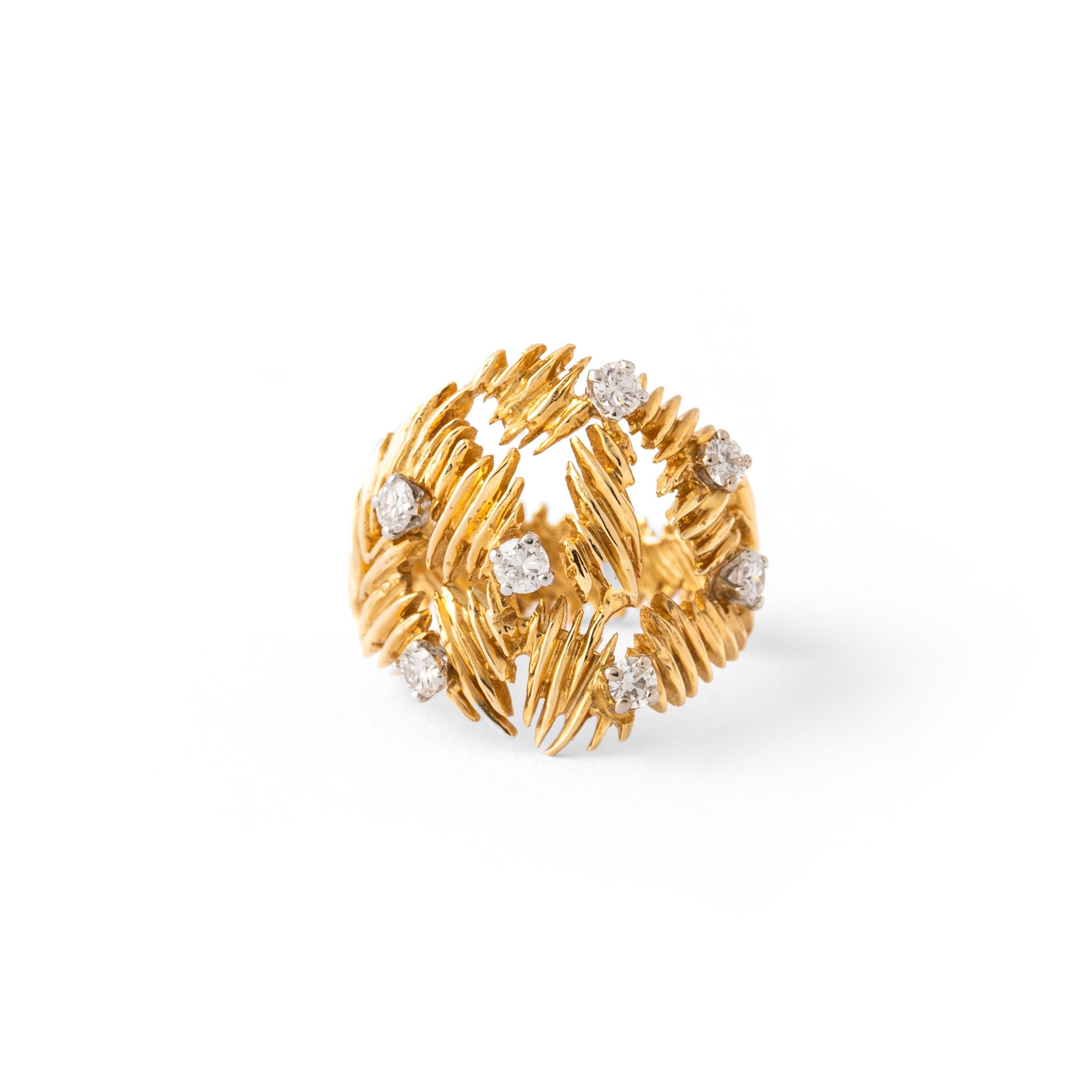 Introducing the exquisite Gilbert Albert Diamond Yellow Gold 18K Ring, a true testament to late 20th-century craftsmanship. This stunning piece features a masterfully designed 18K yellow gold band, showcasing the elegance and brilliance of this