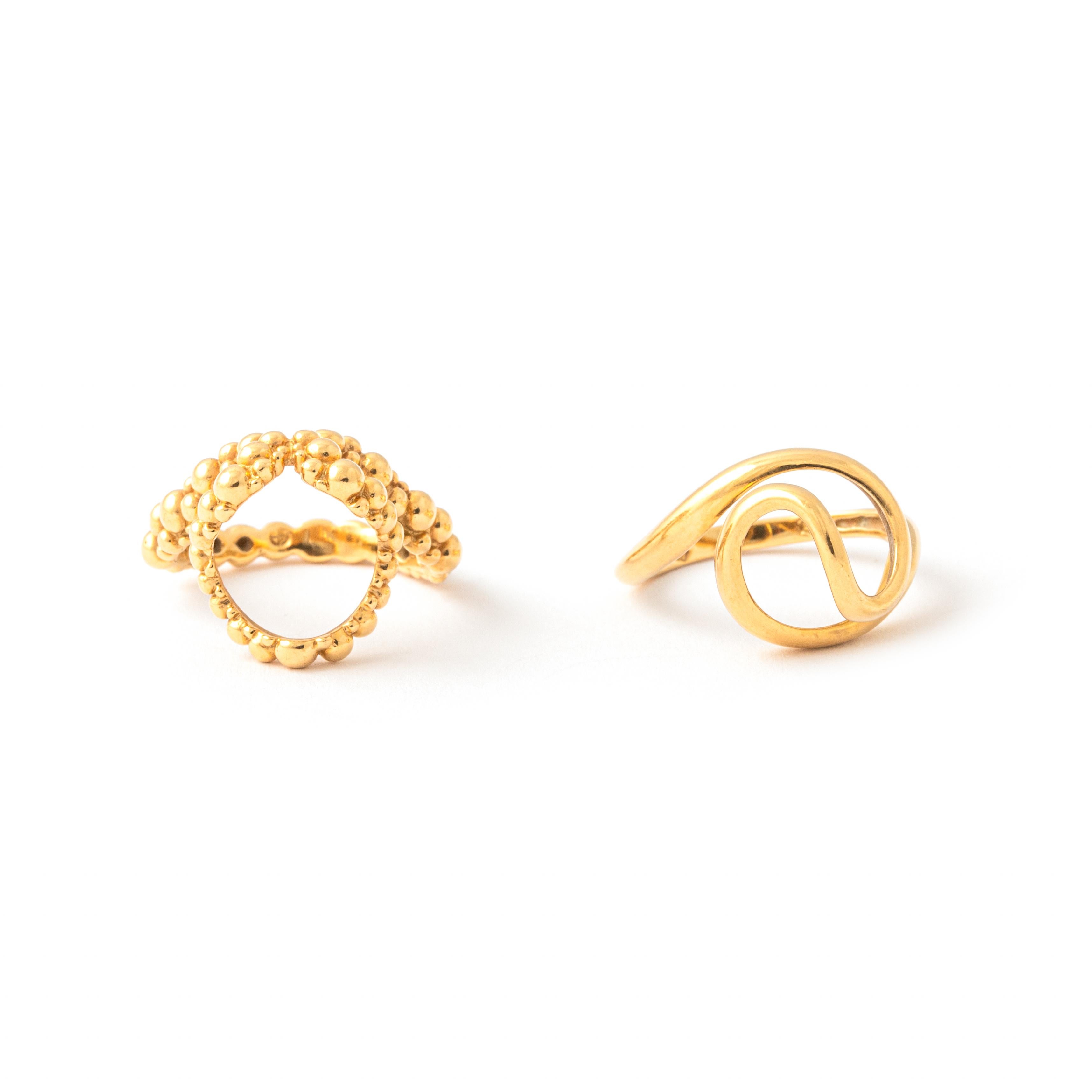 Zwei Ringe aus 18 Karat Gelbgold mit Tigerauge von Gilbert Albert (Perle)