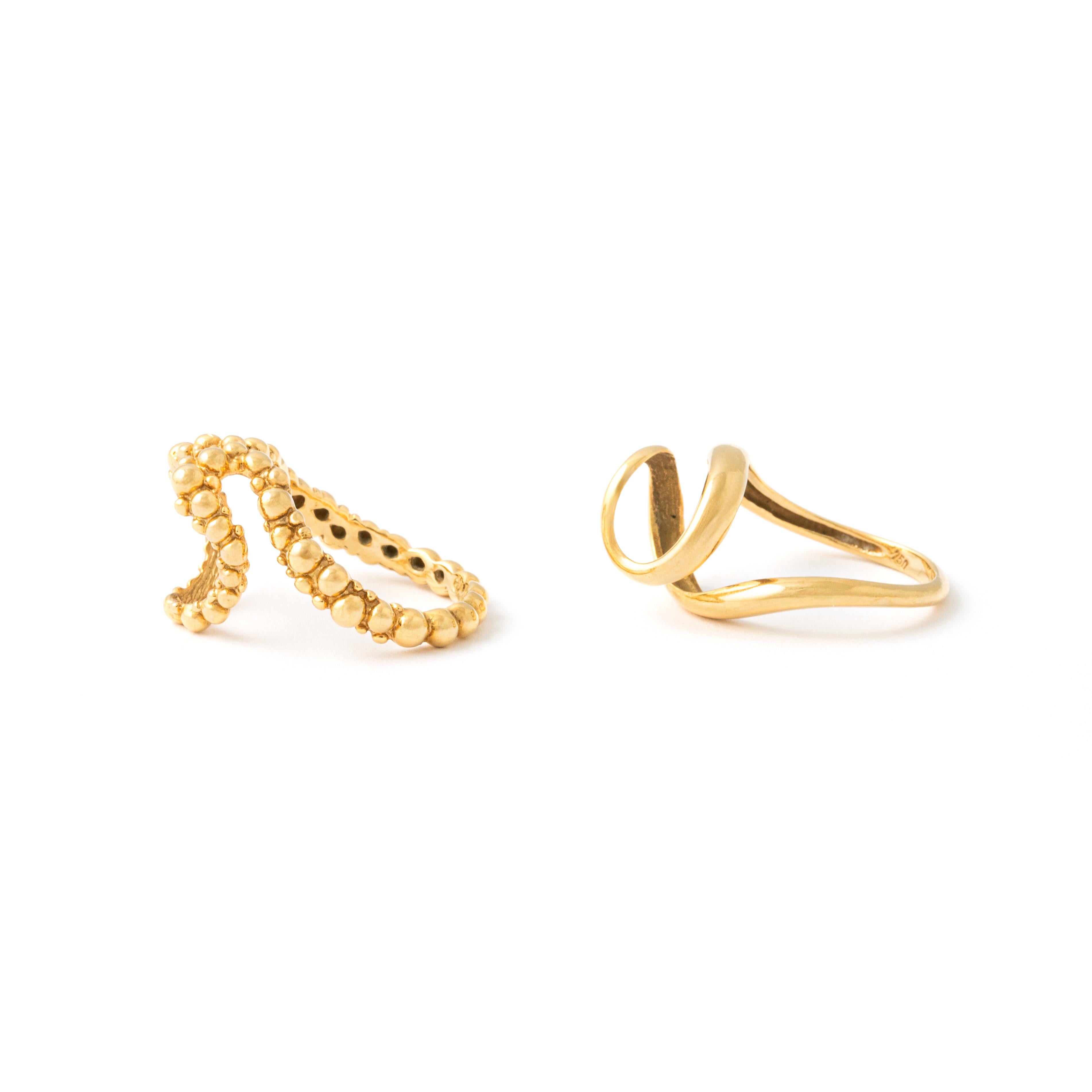 Zwei Ringe aus 18 Karat Gelbgold mit Tigerauge von Gilbert Albert 1