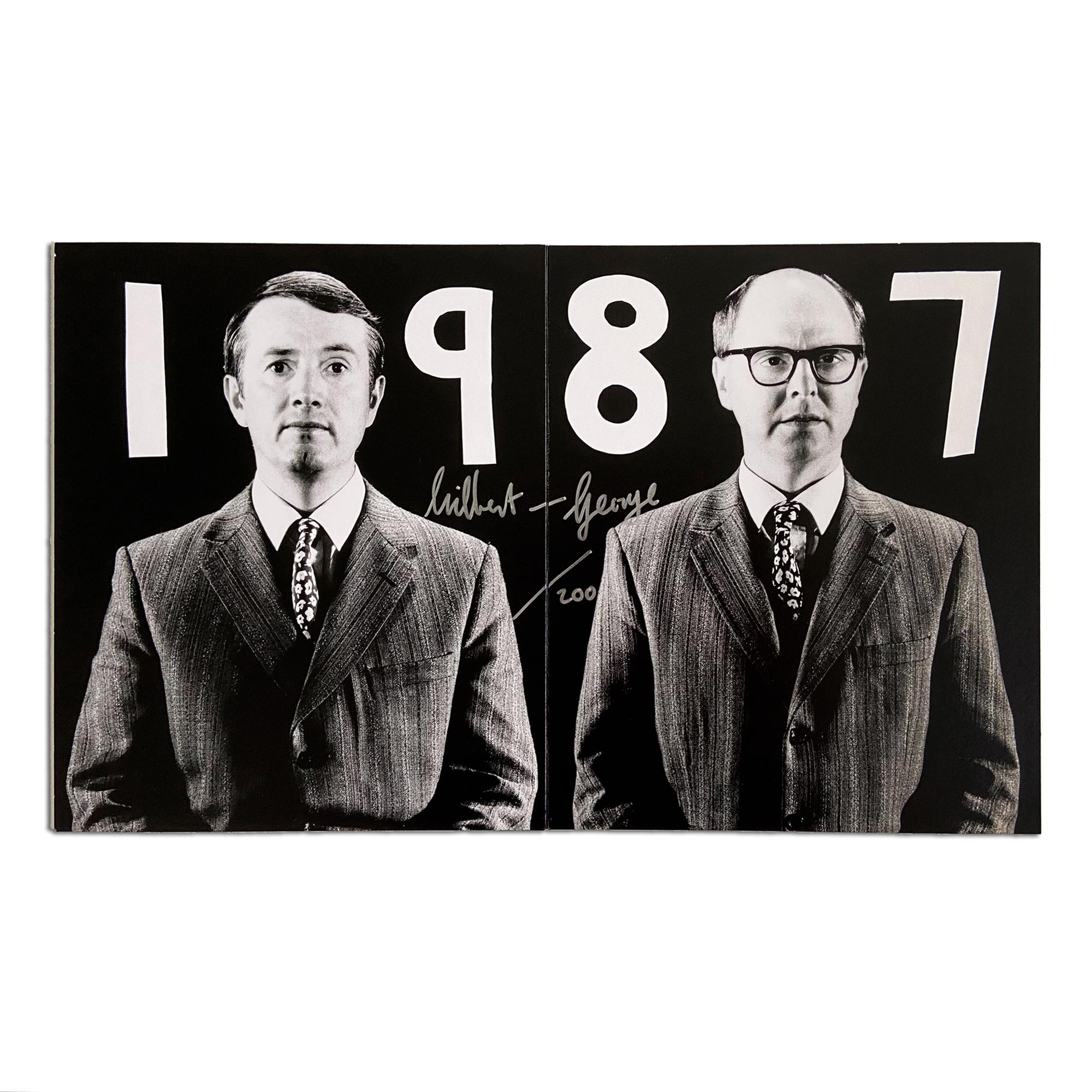 Gilbert & George (British, b. 1942 and 1943)
1987 (Parkett Edition No. 14), 1987
Medium: Photograph, mounted on cardboard, folded in the middle
Dimensions:  25,5 x 42 cm (10 x 16.5 in)
Edition of 200: Hand-signed and numbered in felt-tip