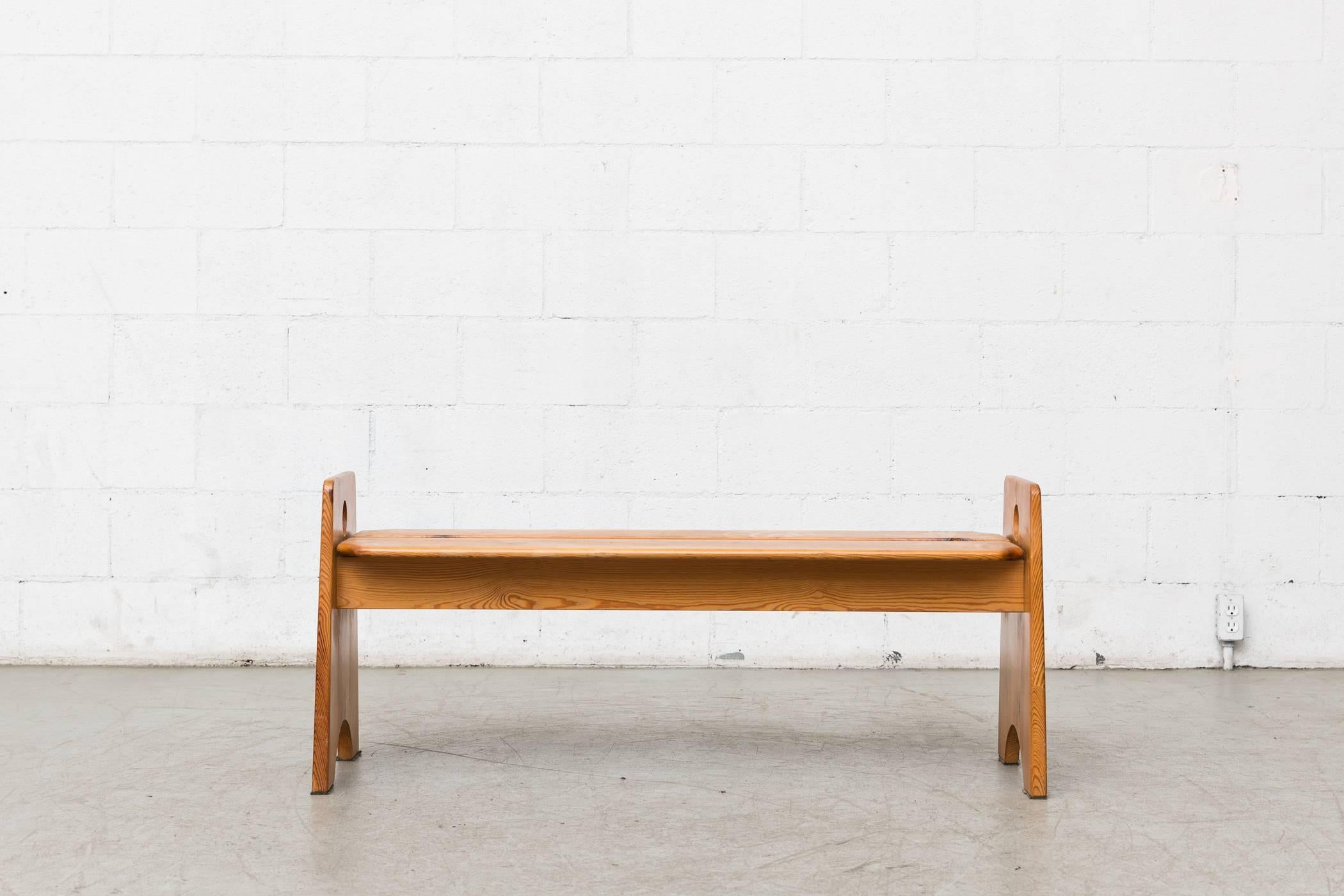 Charlotte Perriand inspired midcentury pine bench with round cut-out detail. Lightly refinished.