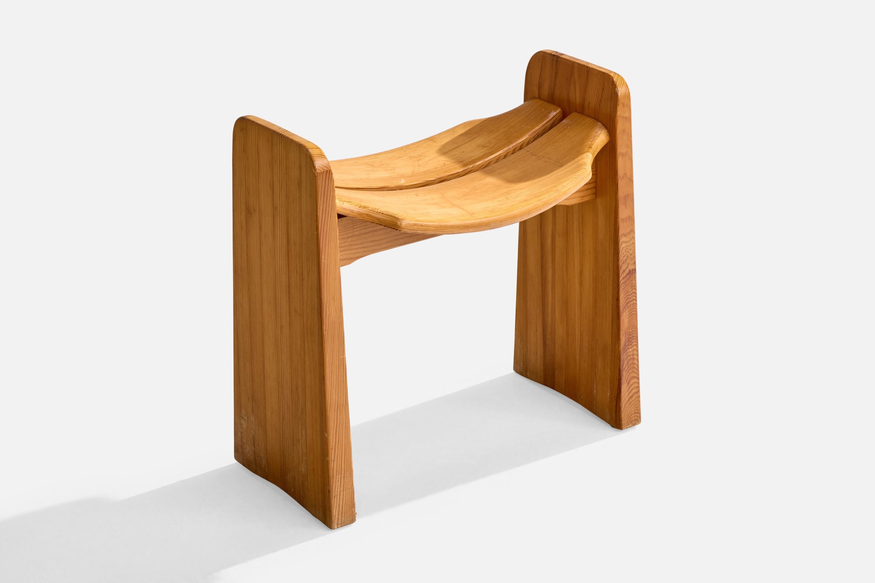 A pine stool designed by Gilbert Marklund and produced by Furusnickaren, Sweden, 1970s.

Overall Dimensions (inches): 18.25