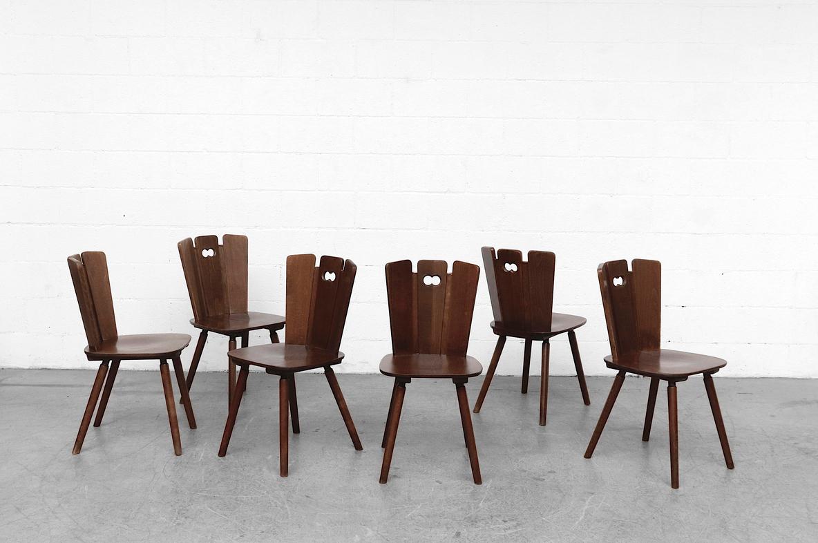 Gilbert Marklund style Brutalist dining chairs with fan-top seat backs and copper detail. Lightly refinished but in otherwise original condition with wear consistent with age and use. Individually priced. 1 week lead time, but may vary depending on
