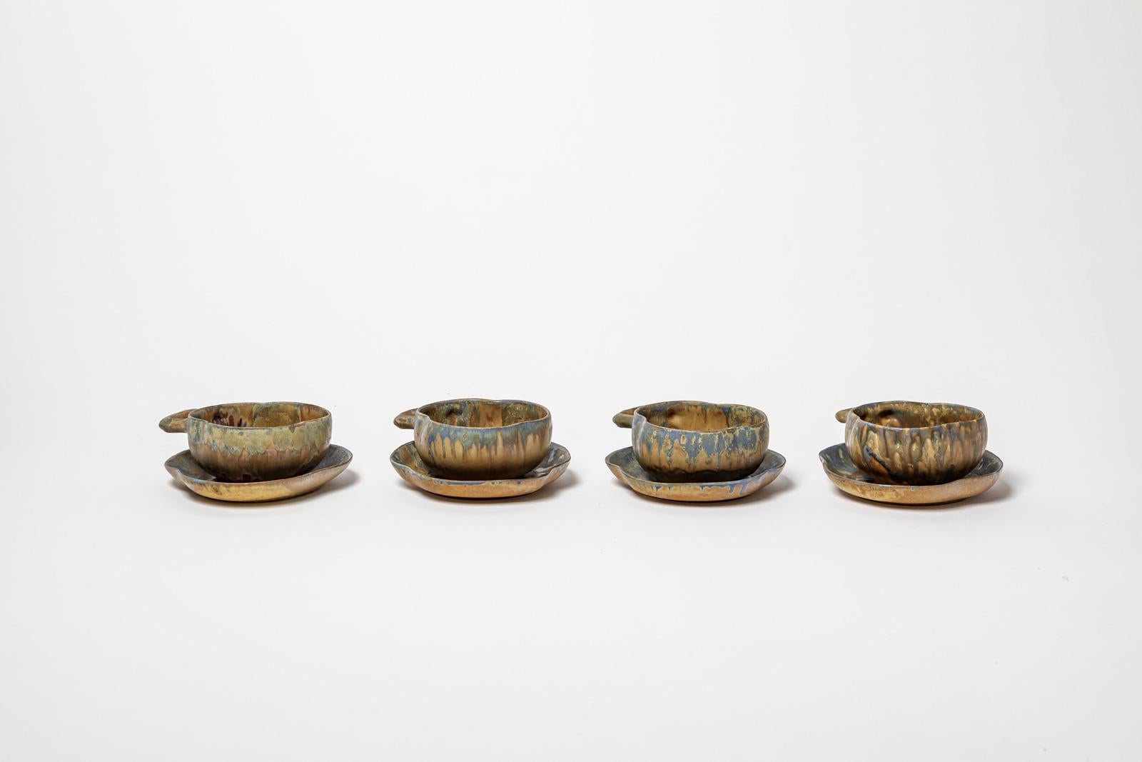 Gilbert Metenier

Art nouveau ceramic set of 4 cofee or tea cup or bowl

Original good condition

Signed

Height 6 cm
Large 12 cm