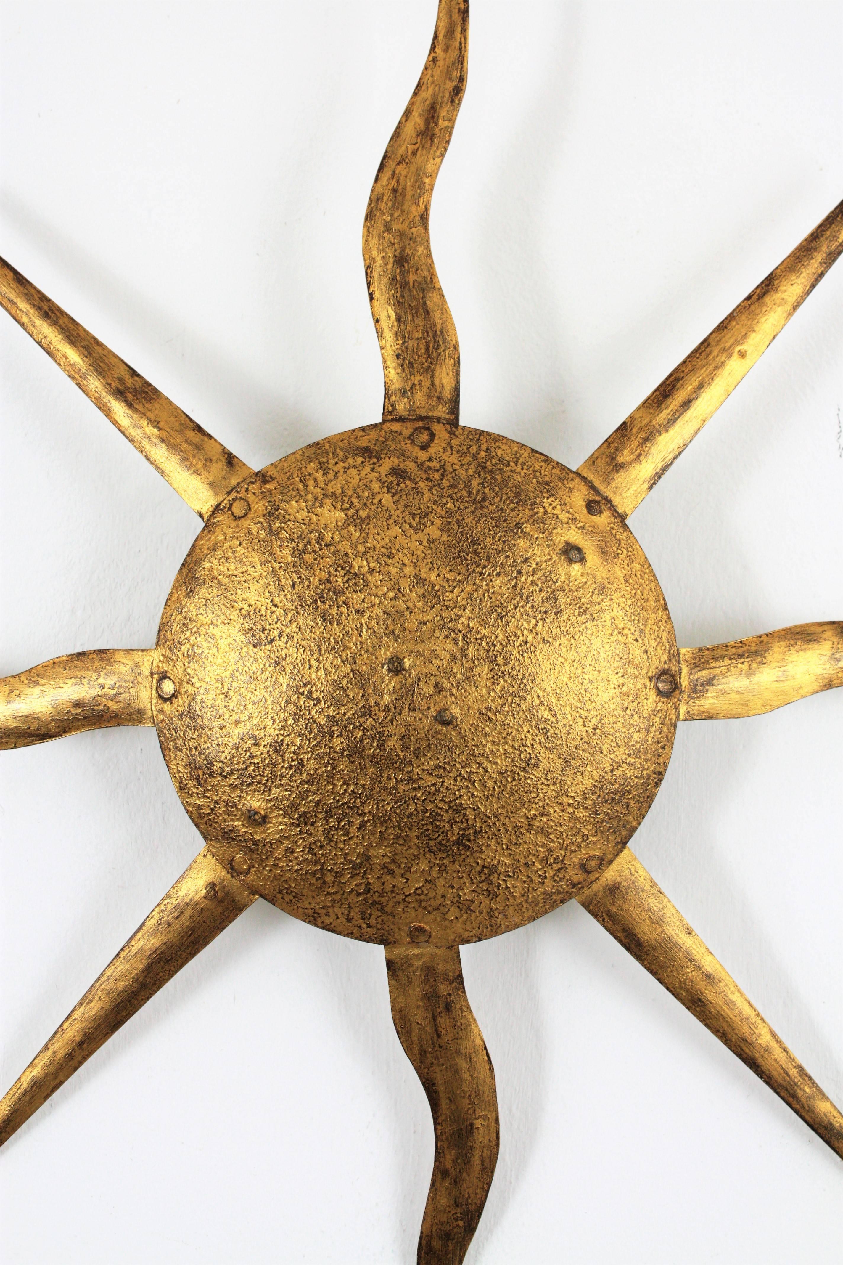 Gilbert Poillerat Style Gilt Iron Sunburst Ceiling Light Fixture or Wall Light In Excellent Condition In Barcelona, ES