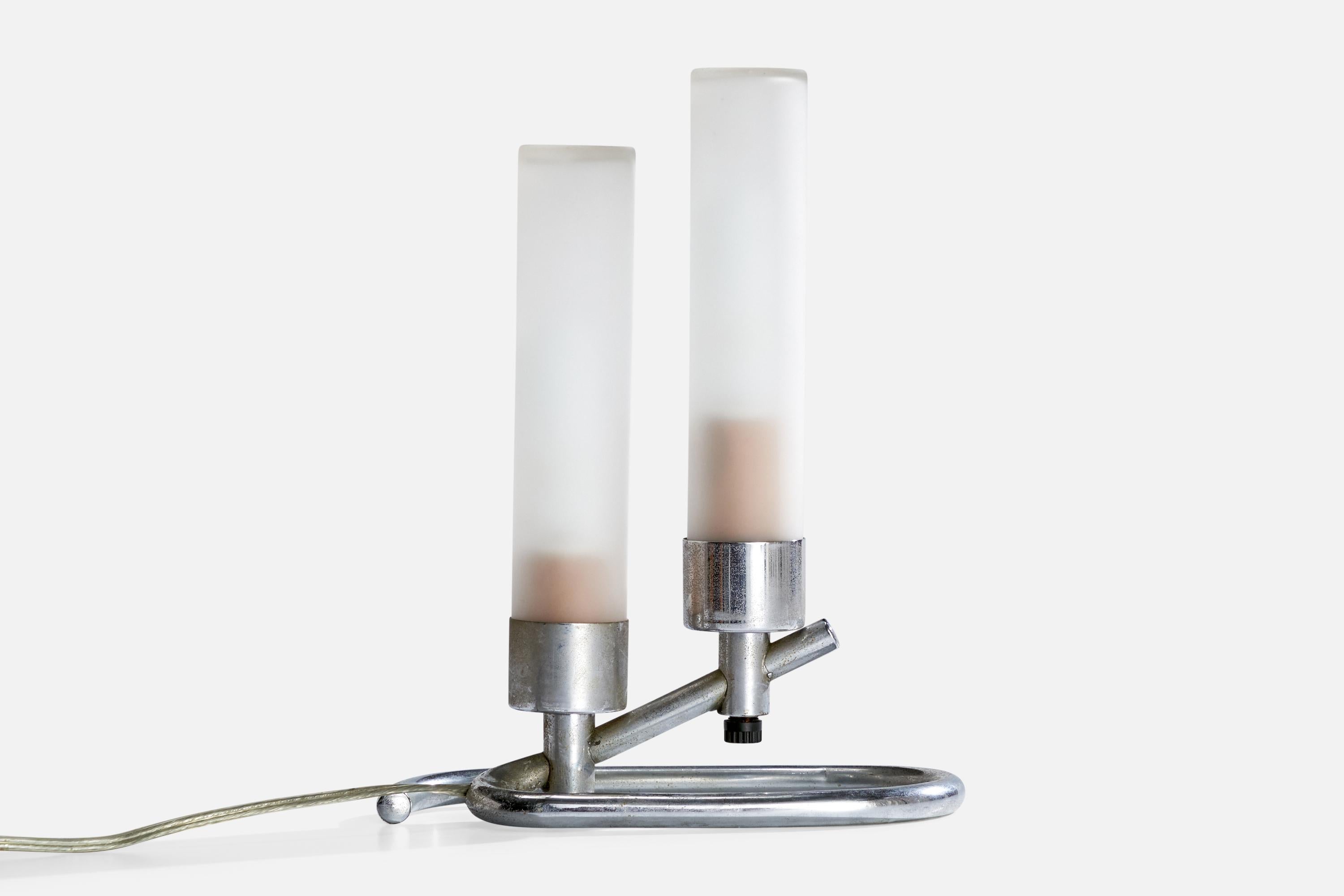 A chrome-plated metal and frosted glass table lamp attributed to Gilbert Rohde, USA, c. 1930s.

Dimensions of Lamp with Shade (inches):  10.75“ H x 8.5“ W x 4.5“ D

Bulb Specifications: E-12 Satco S3715 T6 bulb 

Number of Sockets (per fixture):