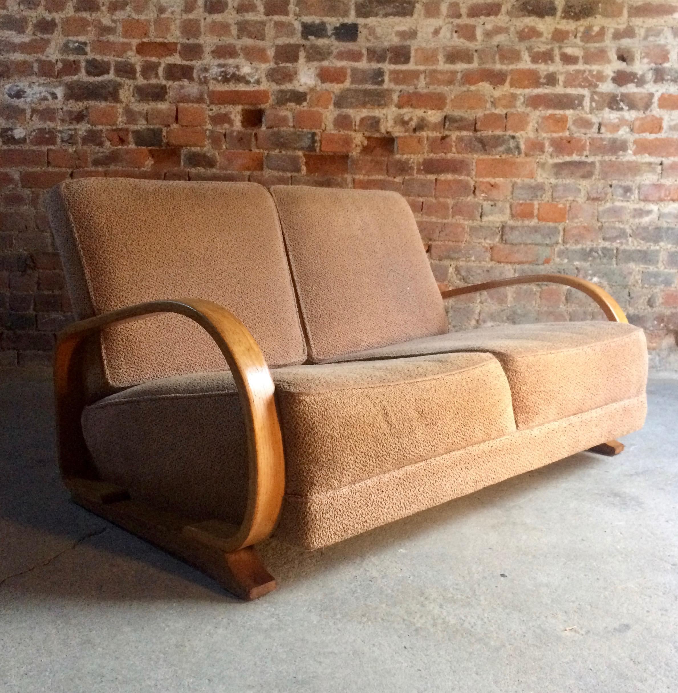 Gilbert Rohde for Heywood-Wakefield, a stunning rare two-seat Art Deco Streamline sofa, circa 1930s, with bentwood arms and neutral fabric upholstery, One of Gilbert Rohde's best Art Deco designs for Heywood-Wakefield, one of the finest examples of