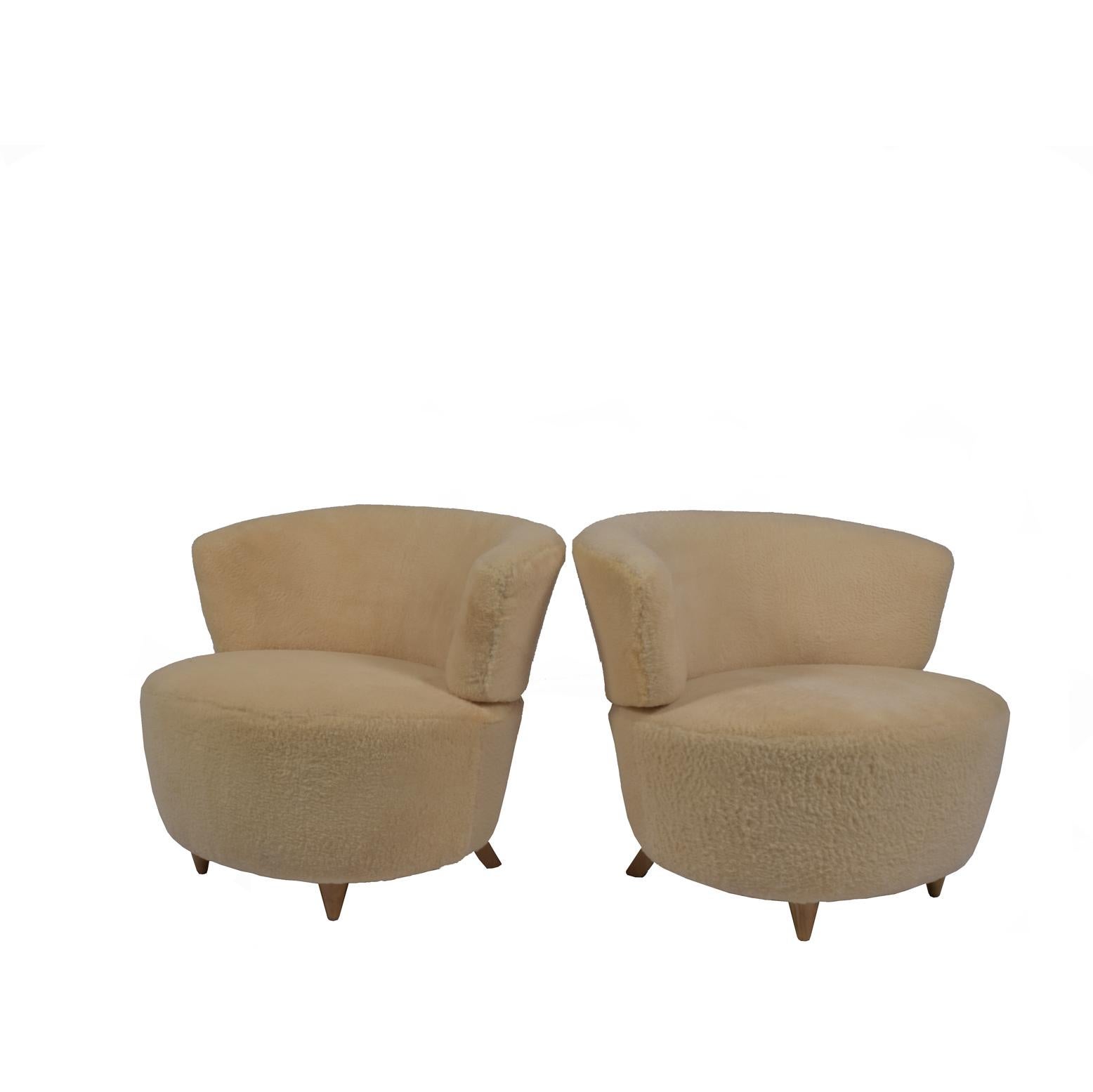 Two lounges design by Gilbert Rohde circa 1940 for Herman Miller new upholstery I sheep skin.