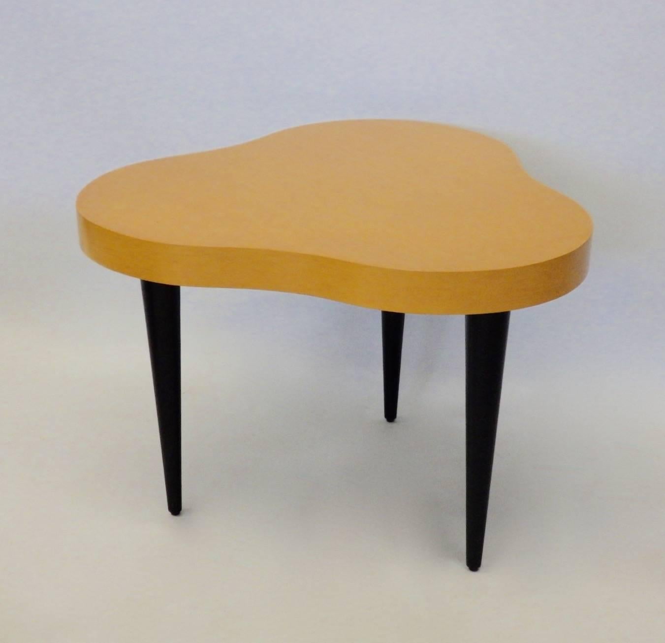 Nicely refinished biomorphic top table in the style of Gilbert Rohde for Herman Miller cloud table series .